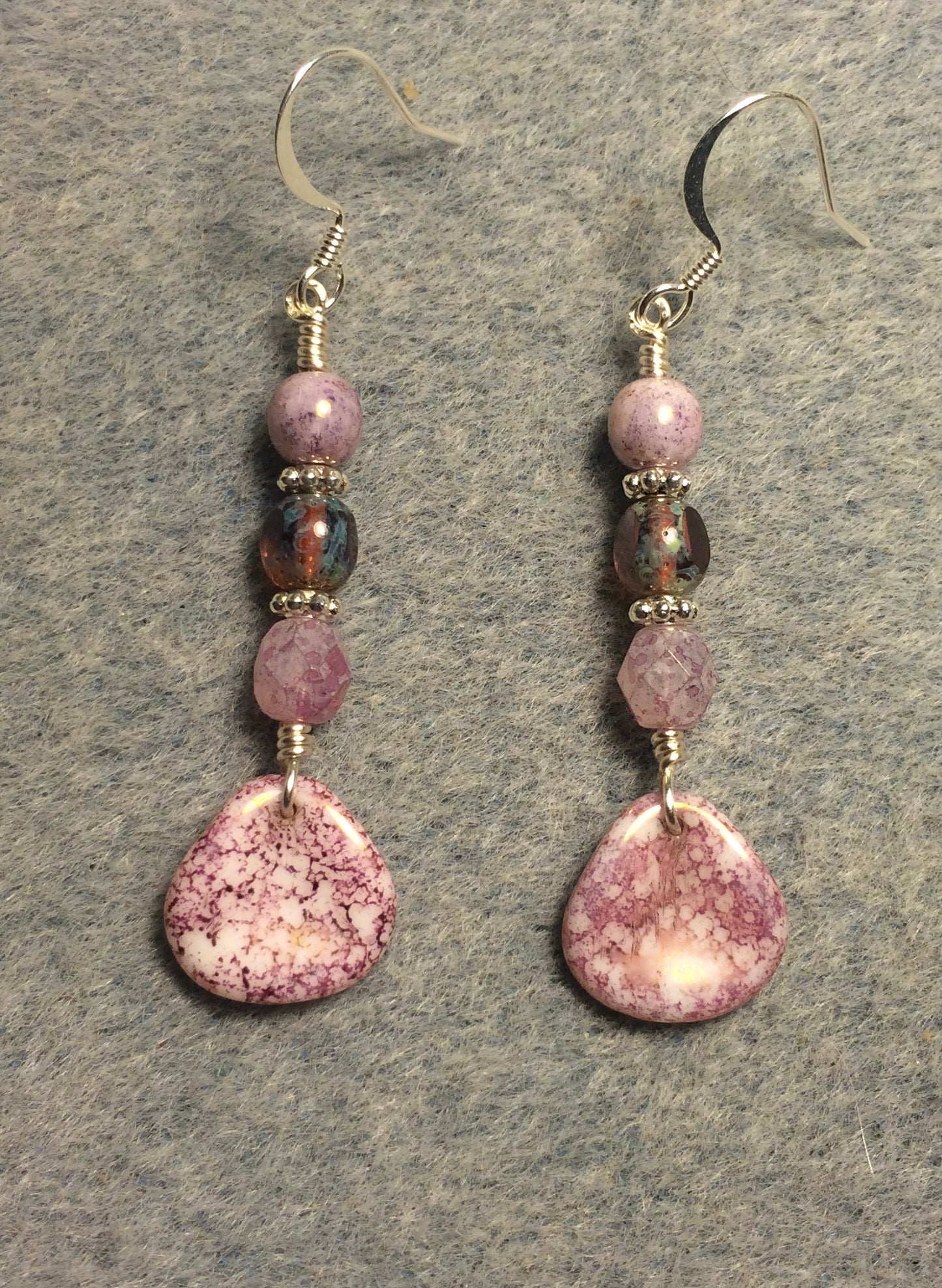 Light pink speckled Czech glass rose petal earrings adorned with pink Czech glass beads.