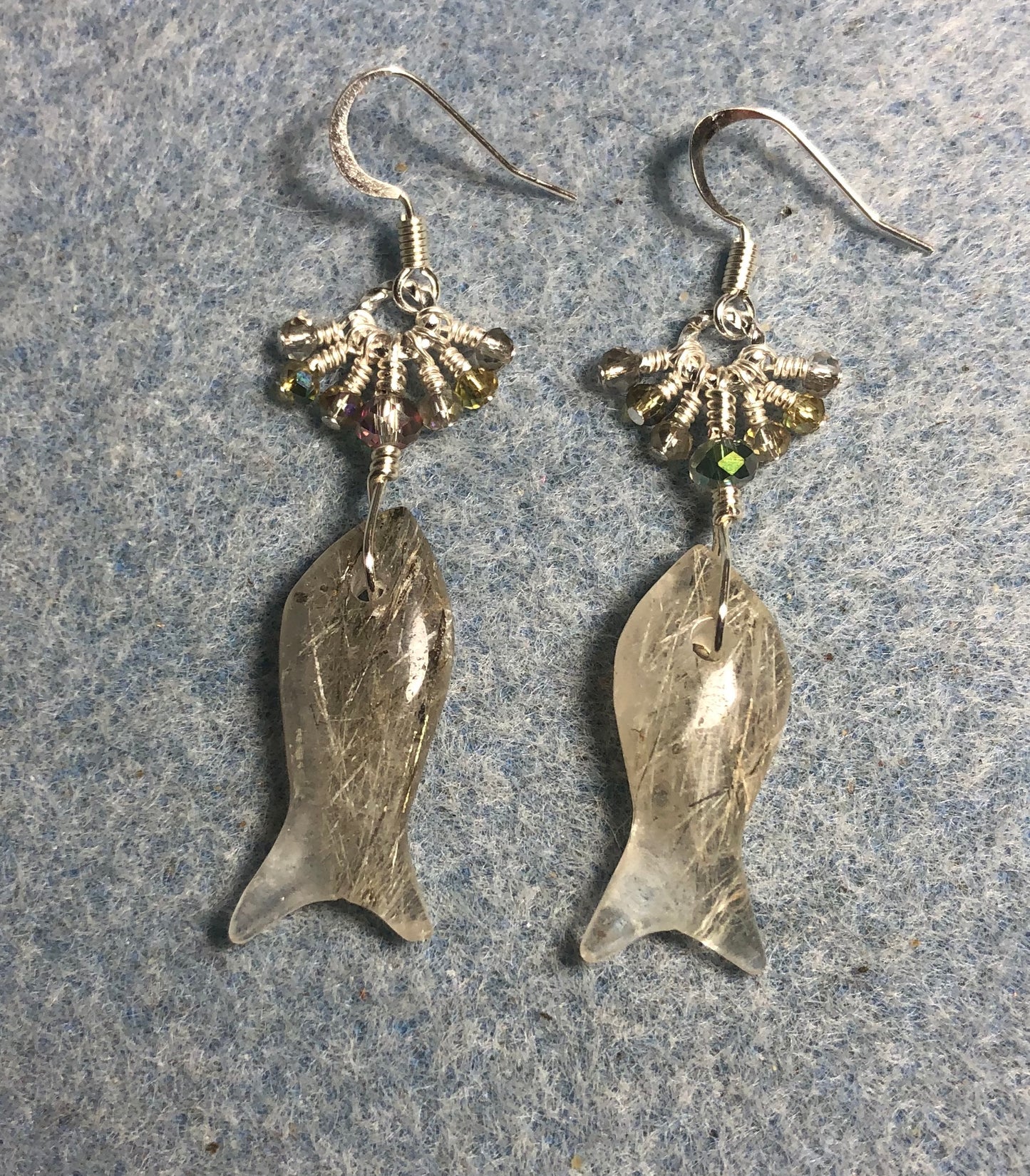 Black tourmaline quartz gemstone fish bead earrings adorned with tiny dangling gray and green Chinese crystal beads.