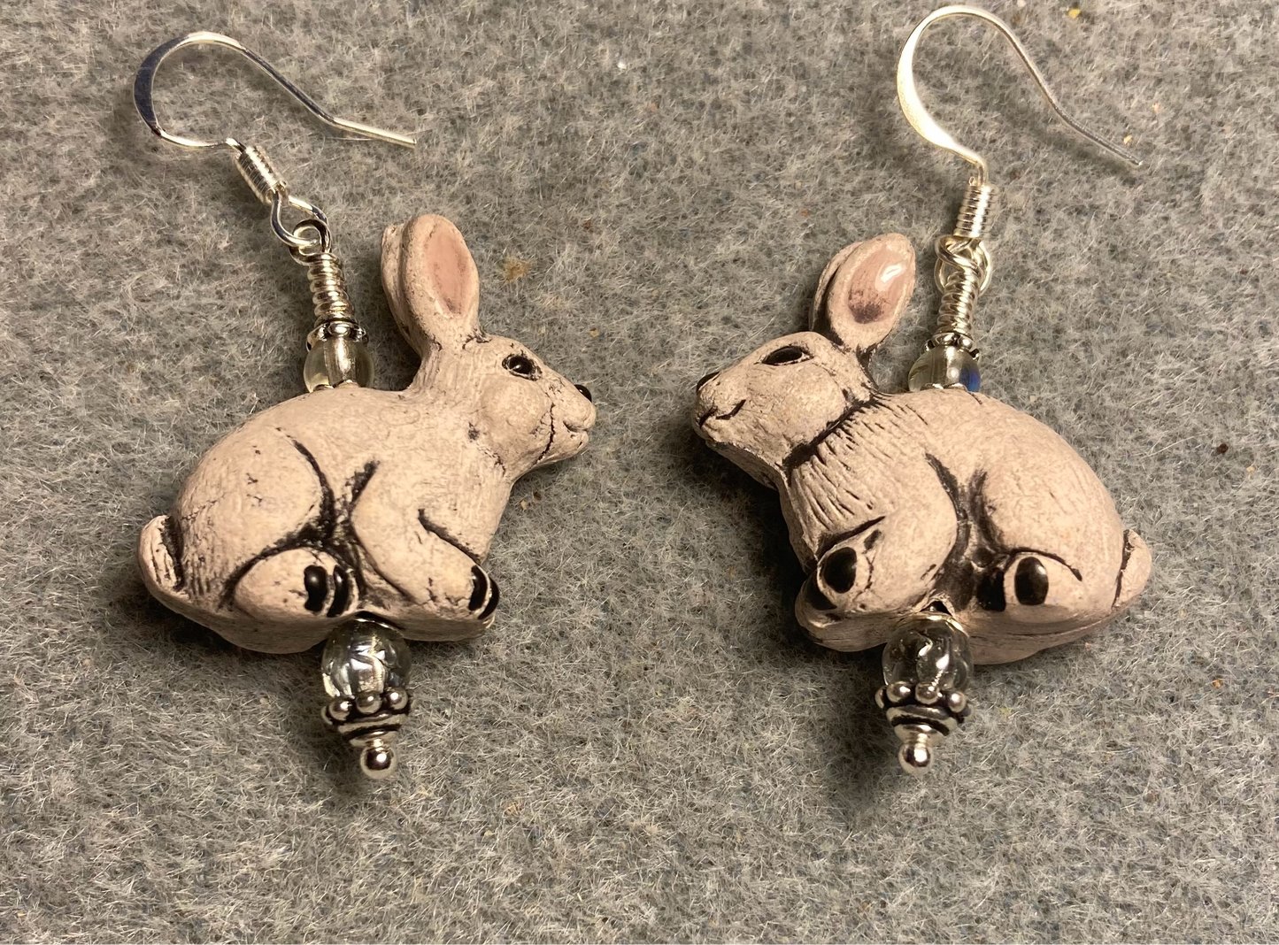 Gray ceramic rabbit bead earrings adorned with gray Czech glass beads.