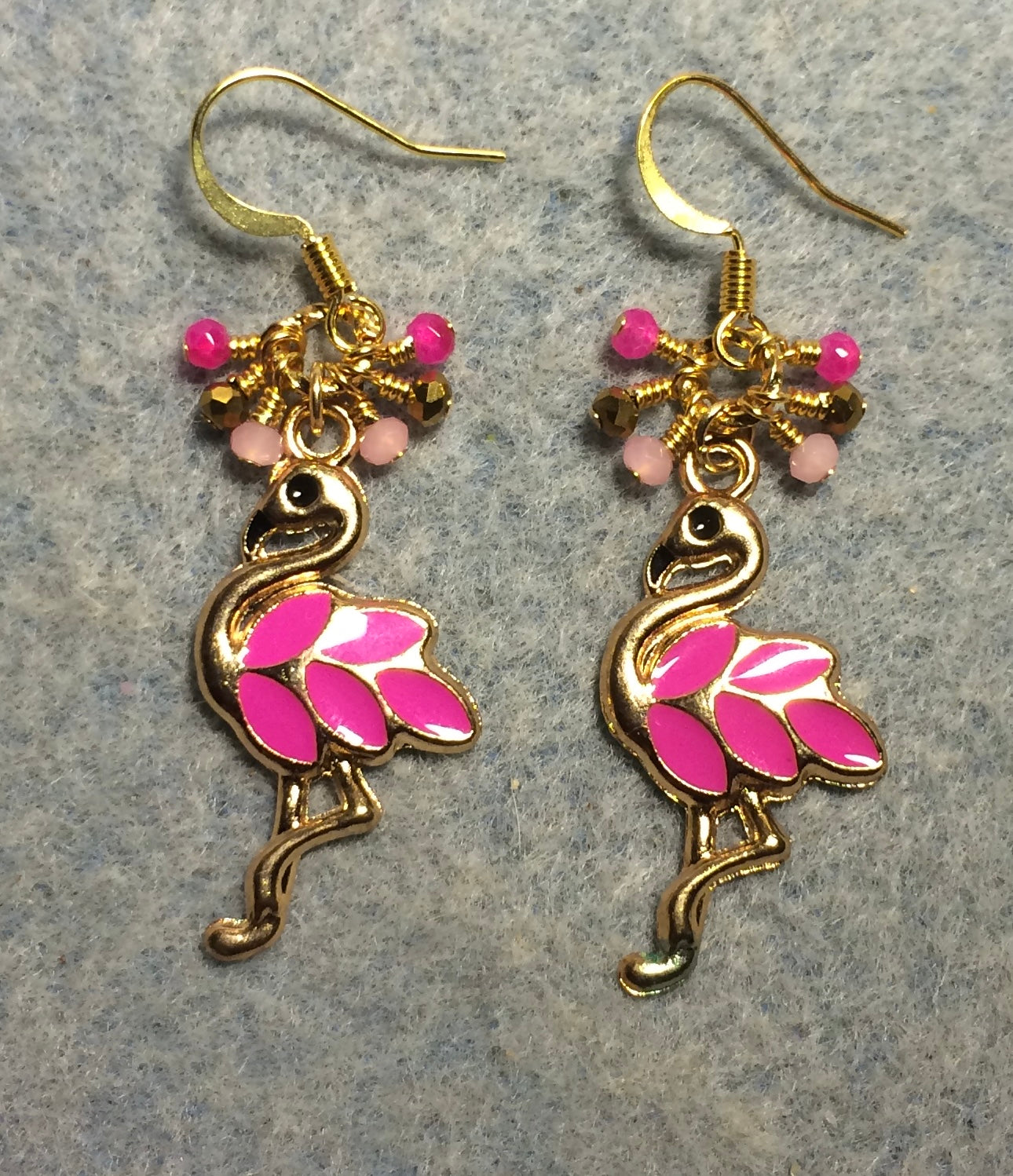 Hot pink and gold enamel flamingo charm earrings adorned with tiny dangling hot pink, light pink, and gold Chinese crystal beads.