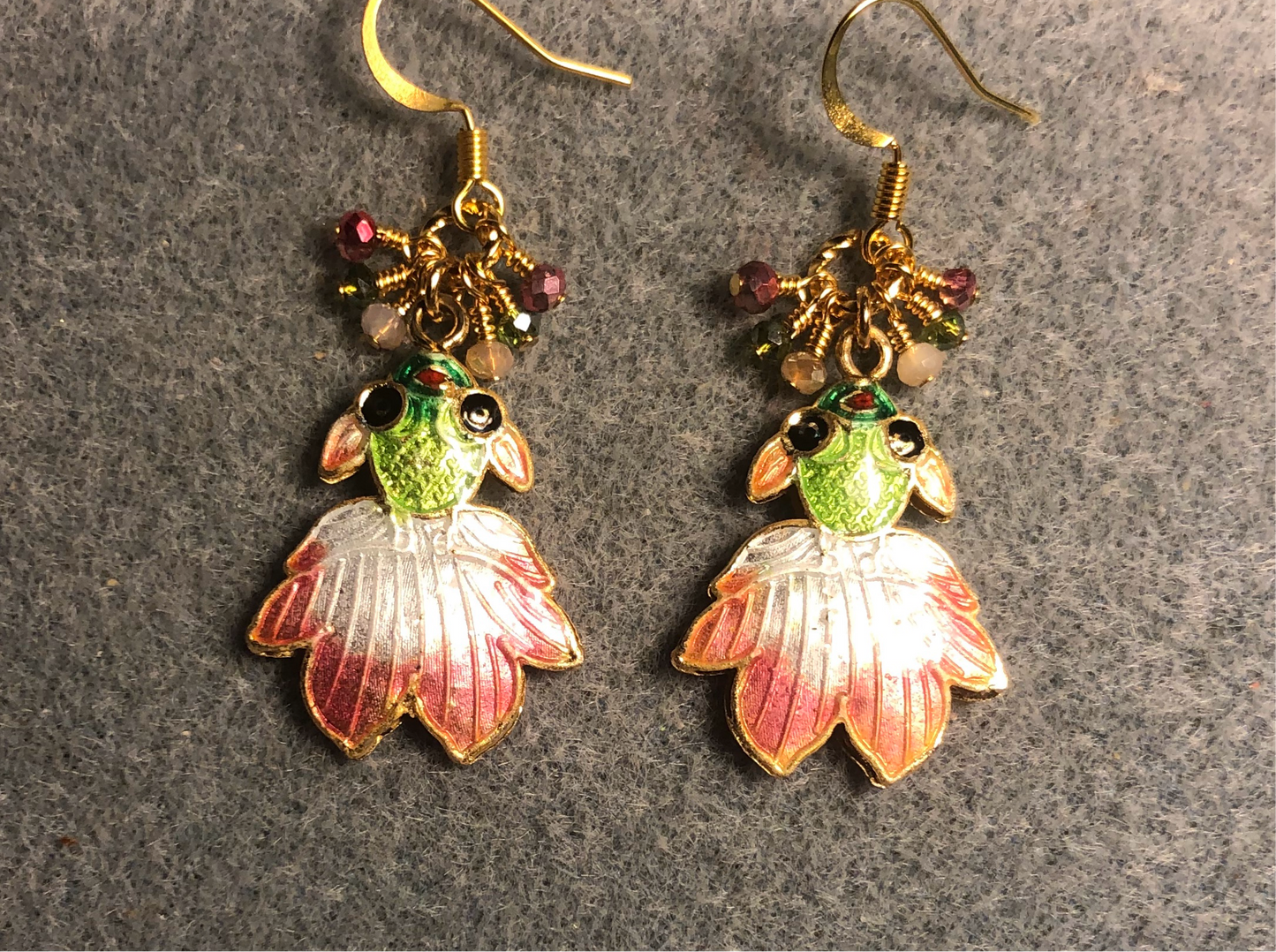 Pink, peach, and green cloisonné goldfish charm earrings adorned with tiny dangling pink, peach, and green Chinese crystal beads.