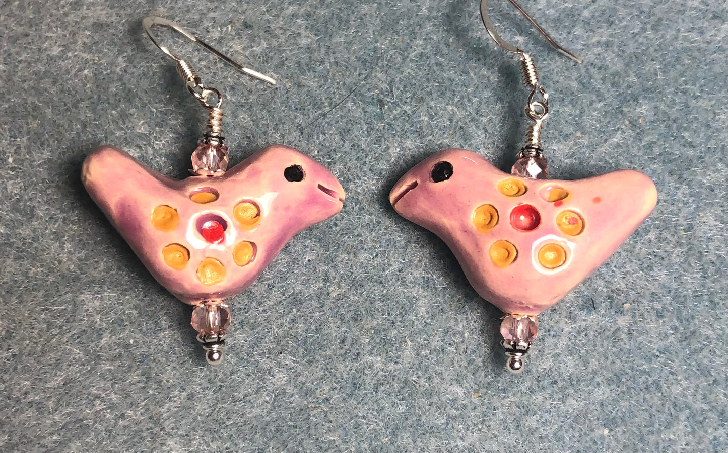Medium pink, yellow, and red ceramic songbird bead earrings adorned with pink Chinese crystal beads.