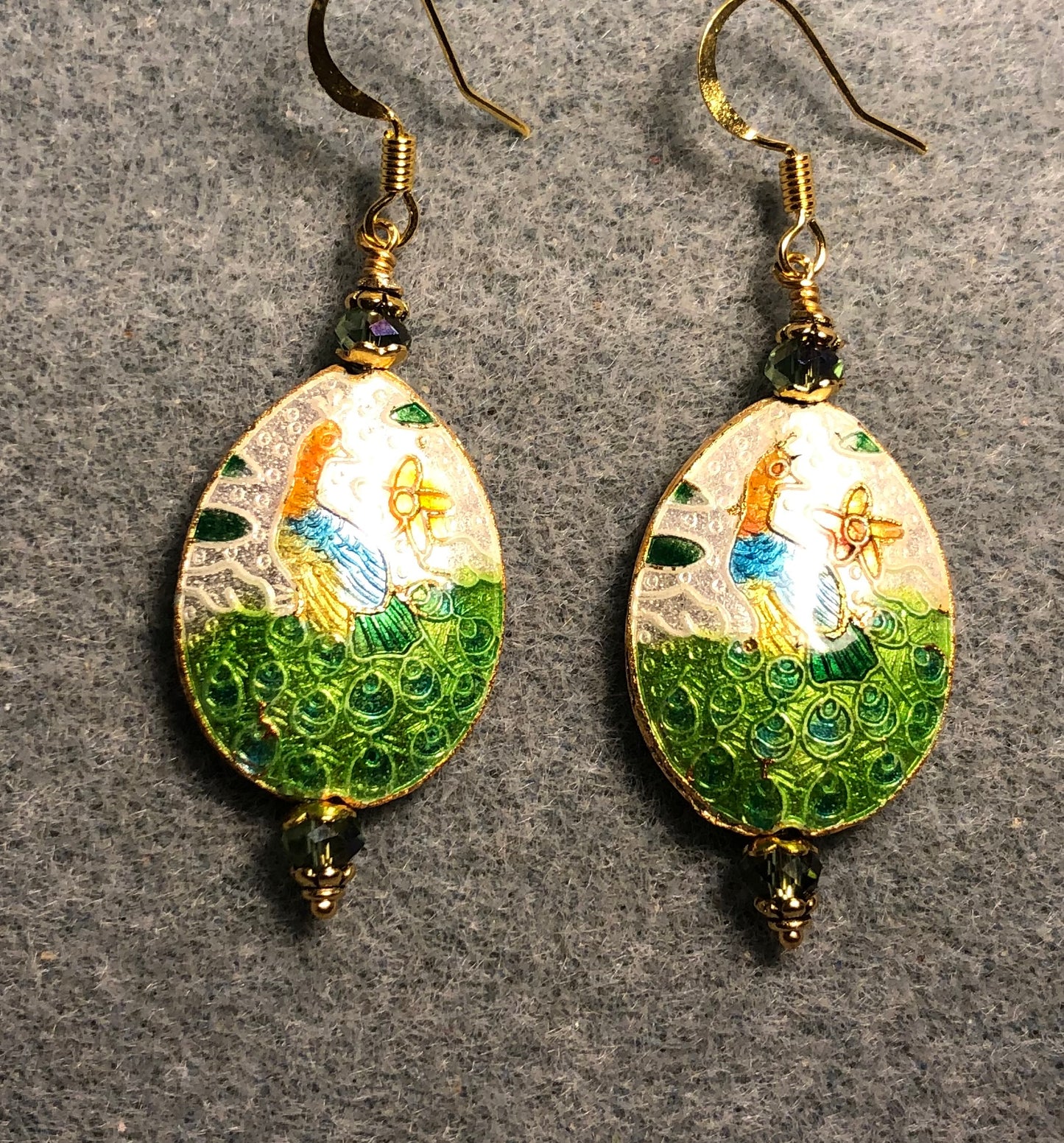 Green, white, and aqua cloisonné peacock bead earrings adorned with sparkly green Chinese crystal beads.