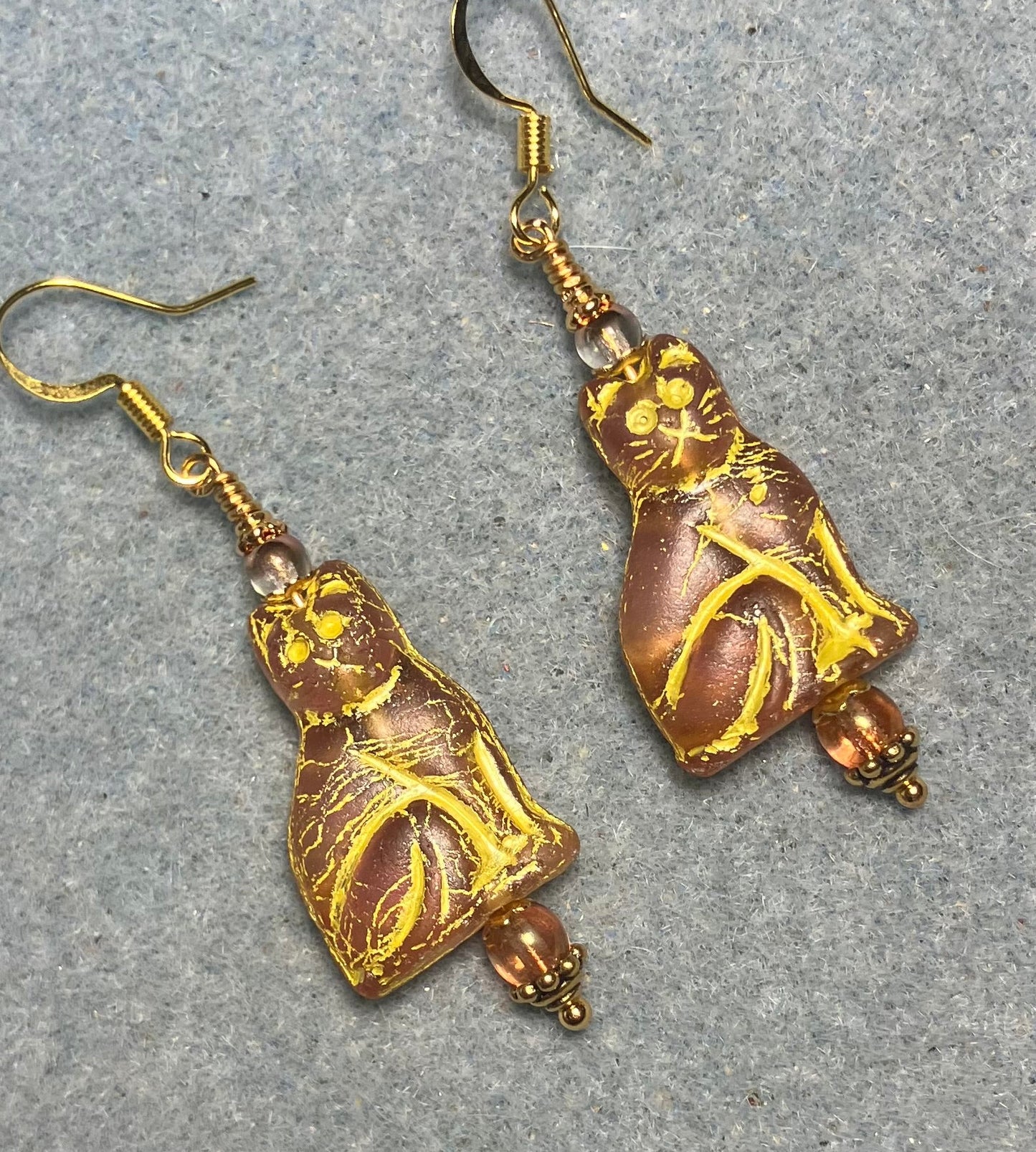 Rose gold (with gold inlay) Czech glass cat bead earrings adorned with rose gold Czech glass beads.