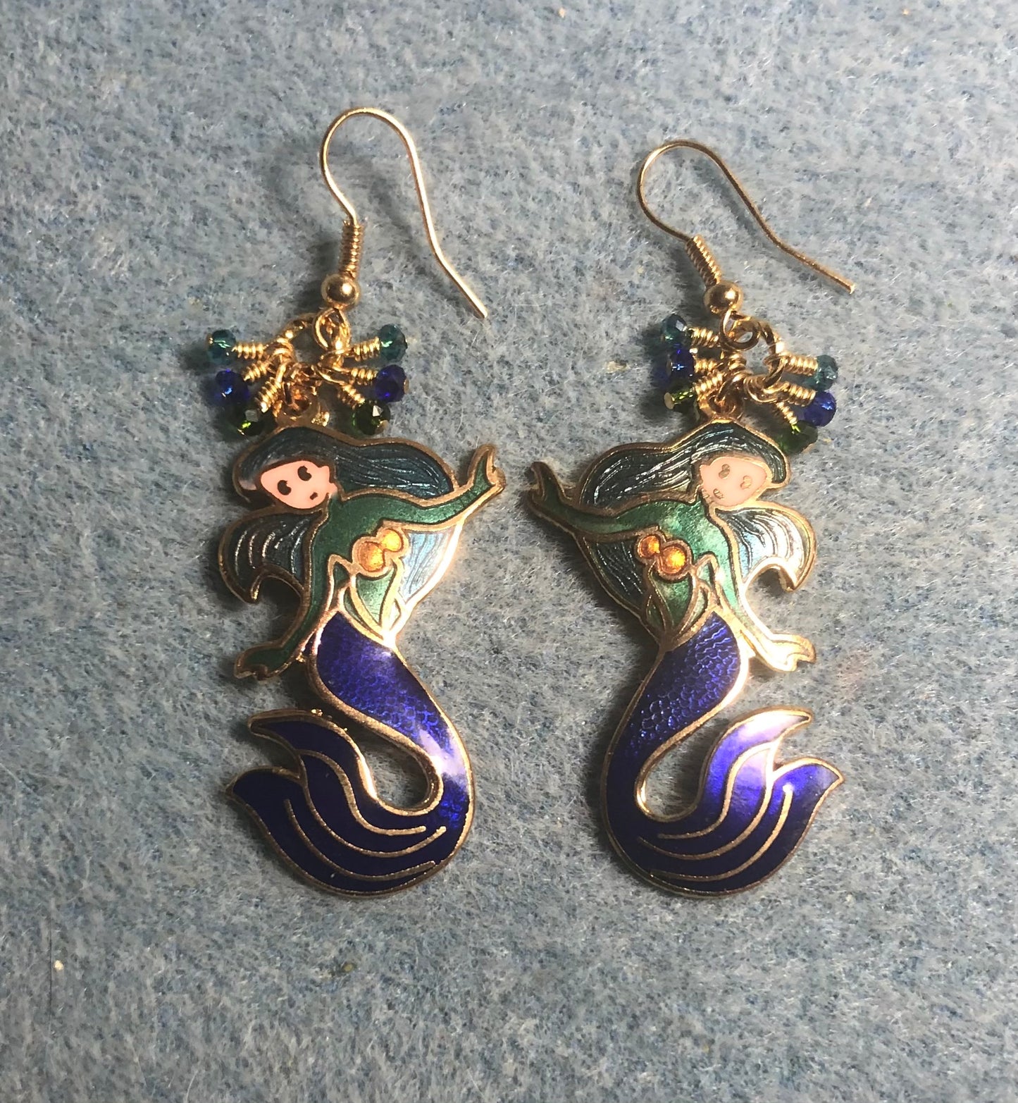Vintage teal, blue, and green cloisonné mermaid charm earrings adorned with tiny dangling teal, blue, and green Chinese crystal beads.