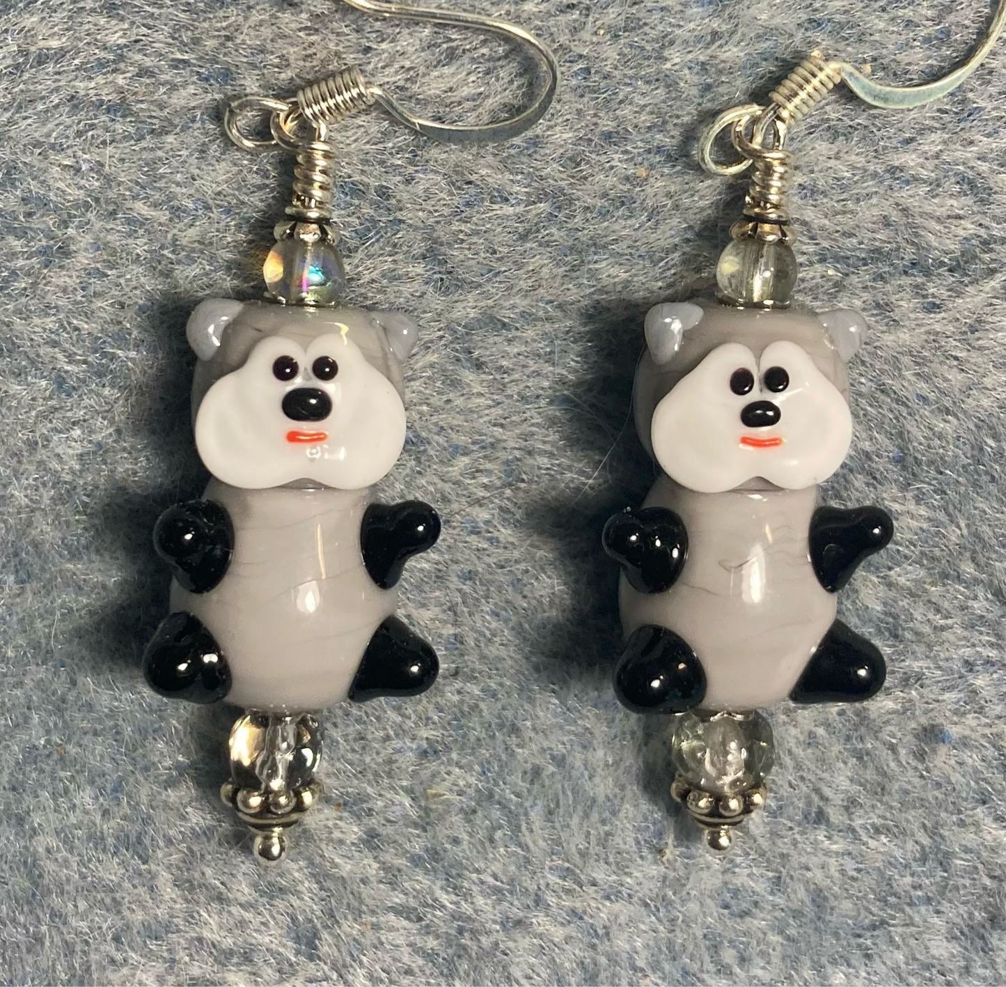Large gray and white lamp work teddy bear bead earrings adorned with clear Czech glass beads.