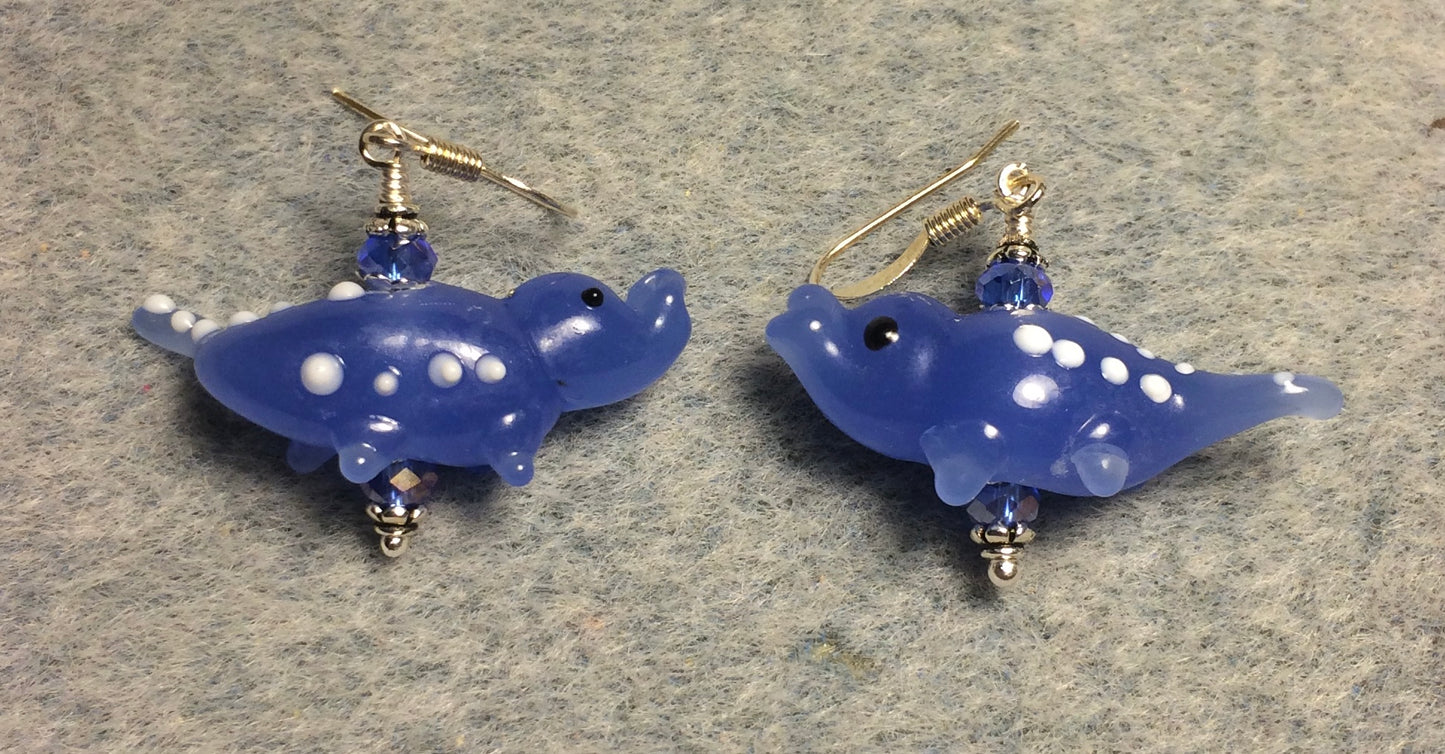 Opaque baby blue lamp work spotted alligator bead earrings adorned with baby blue Chinese crystal beads.