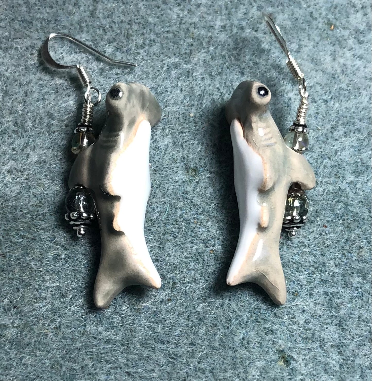 Gray and white ceramic hammerhead shark bead earrings adorned with clear black diamond Czech glass beads.