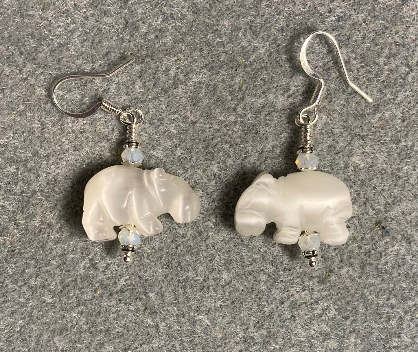 Opalite gemstone hippo bead earrings adorned with white Chinese crystal beads.