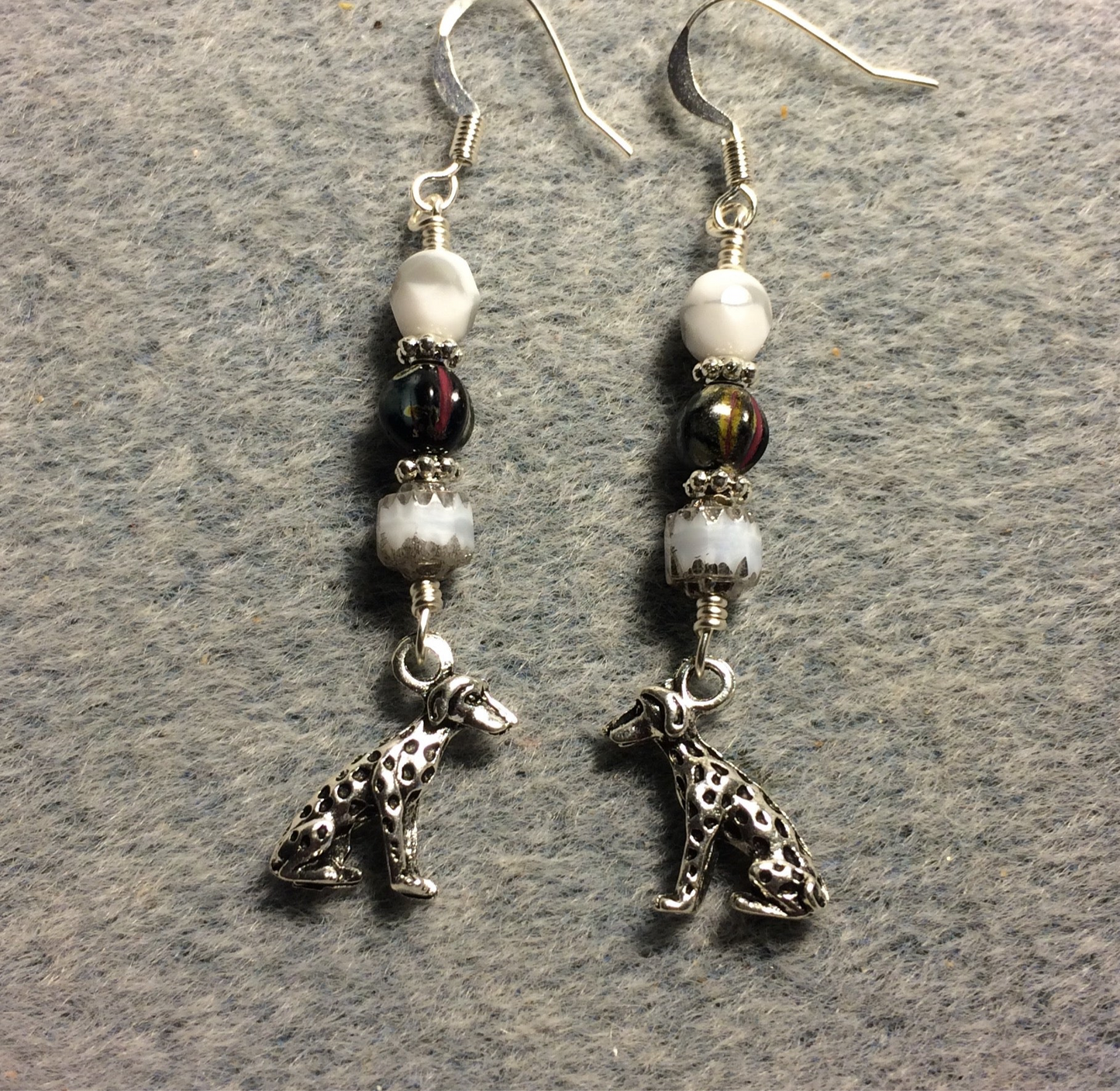 Silver Dalmatian charm earrings adorned with white and black Czech glass beads