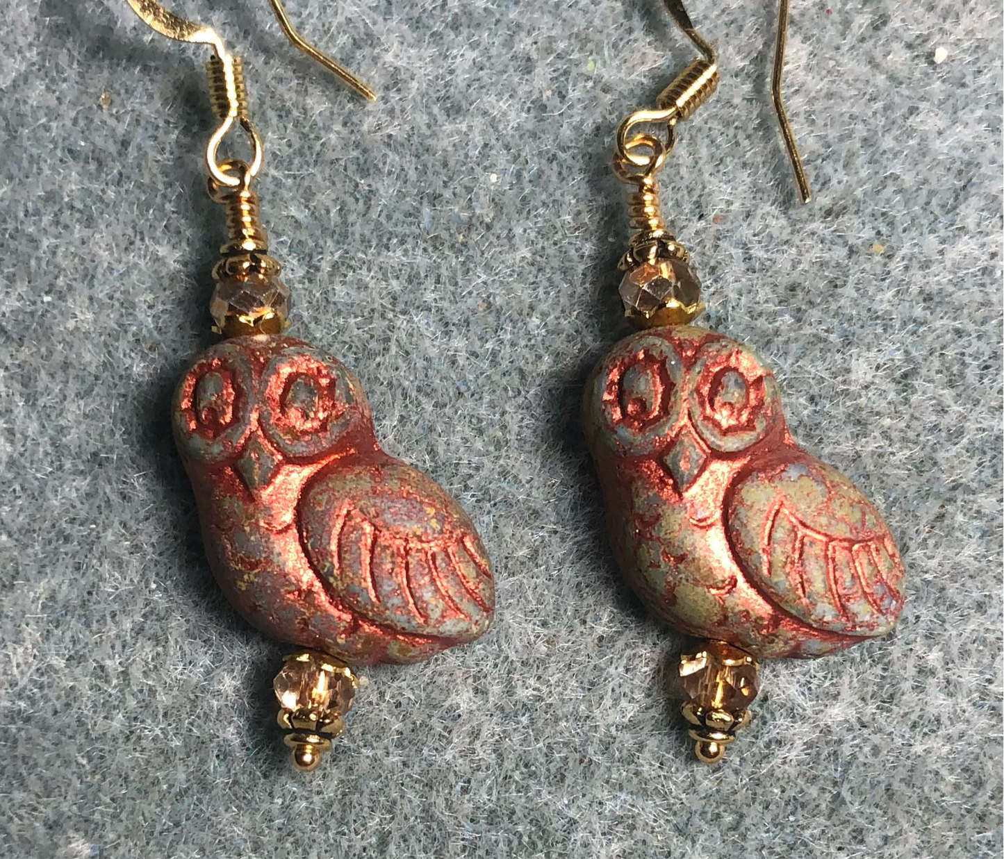 Orange tan (with copper wash) fancy Czech glass owl bead earrings adorned with gold Chinese crystal beads.