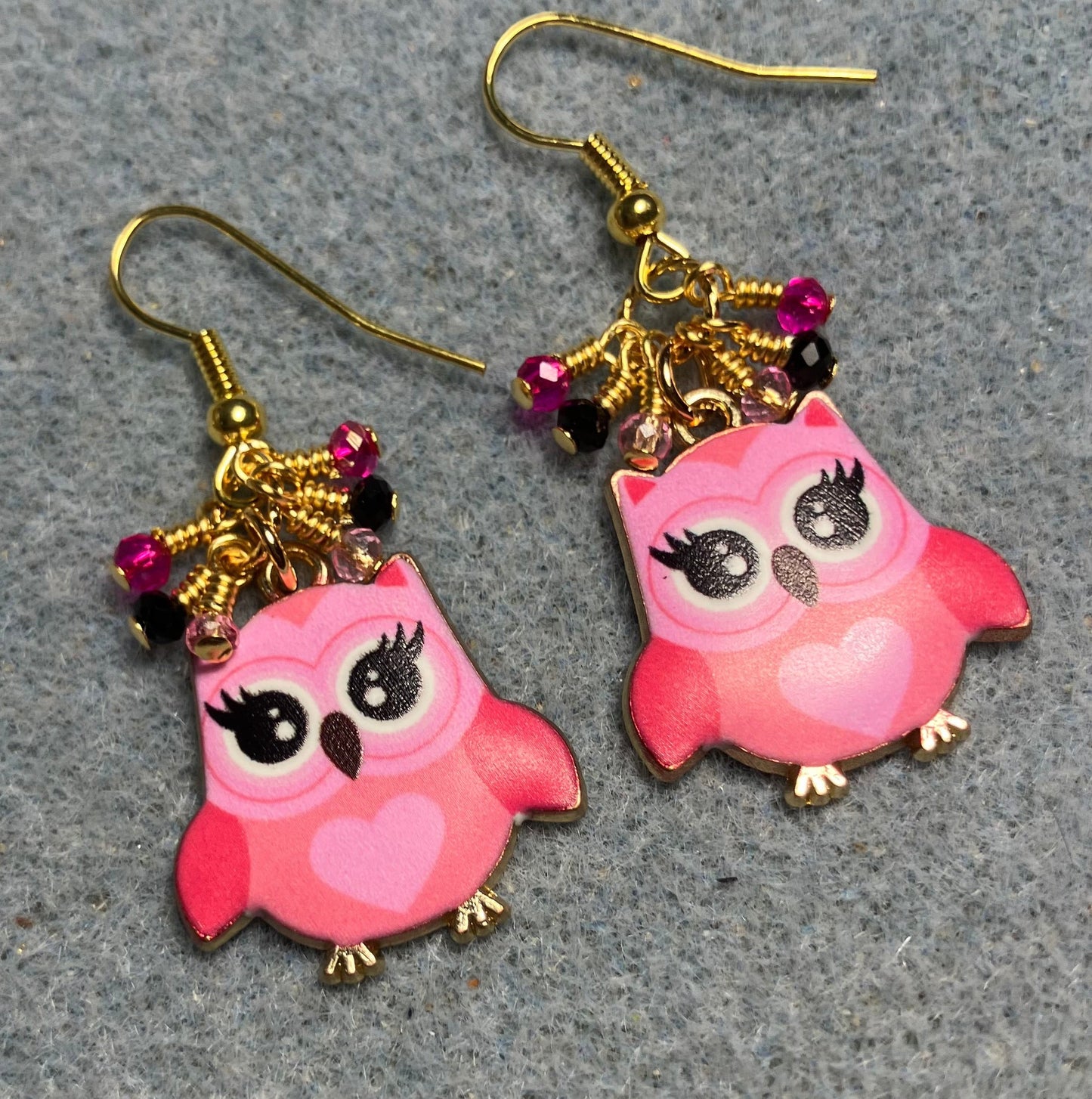 Hot pink, black, and light pink enamel owl charm earrings adorned with tiny dangling hot pink, black, light pink Chinese crystal beads.