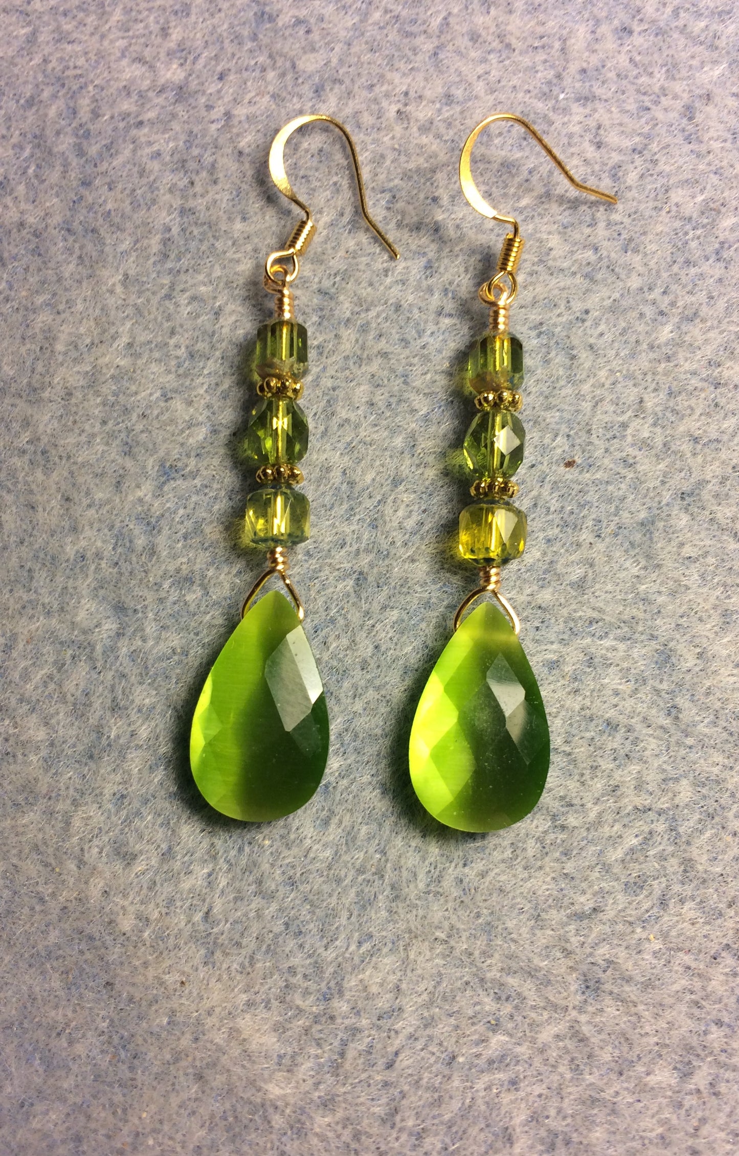 Olive green fiber optic briolette bead earrings adorned with olive green Czech glass beads.