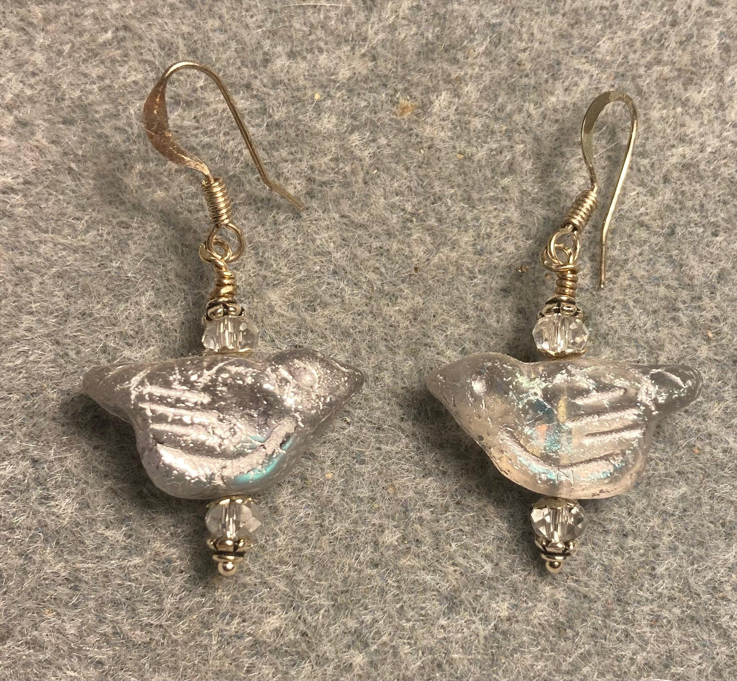 Silver Czech glass bird bead earrings adorned with clear Chinese crystal beads.