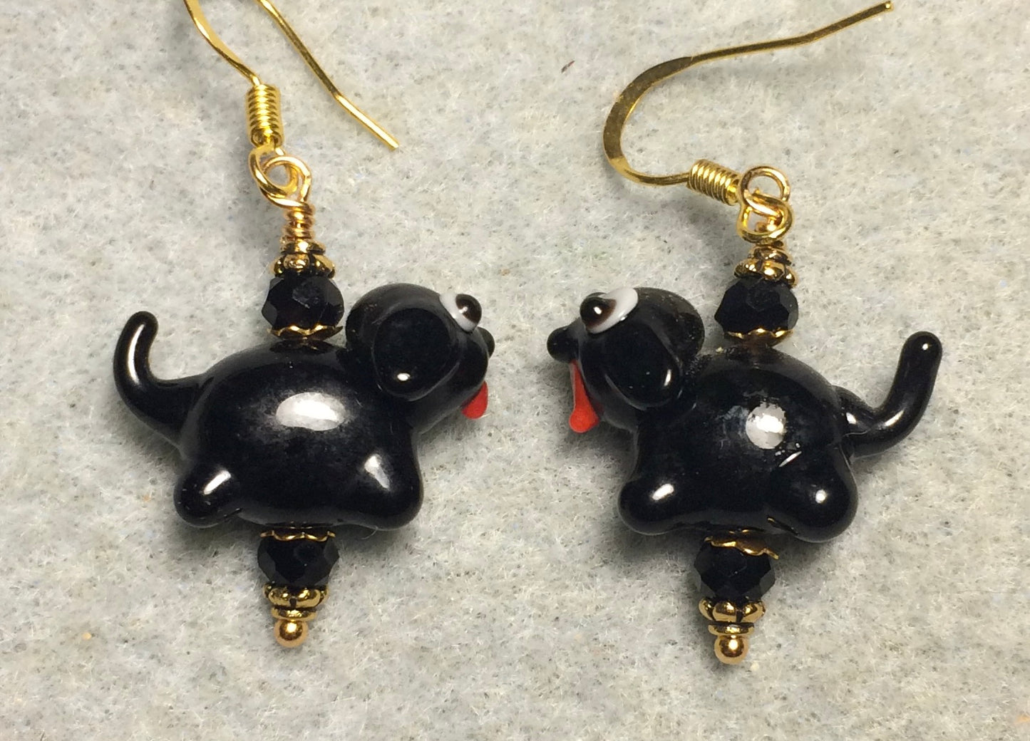 Black lamp work puppy dog bead earrings adorned with black Chinese crystal beads.