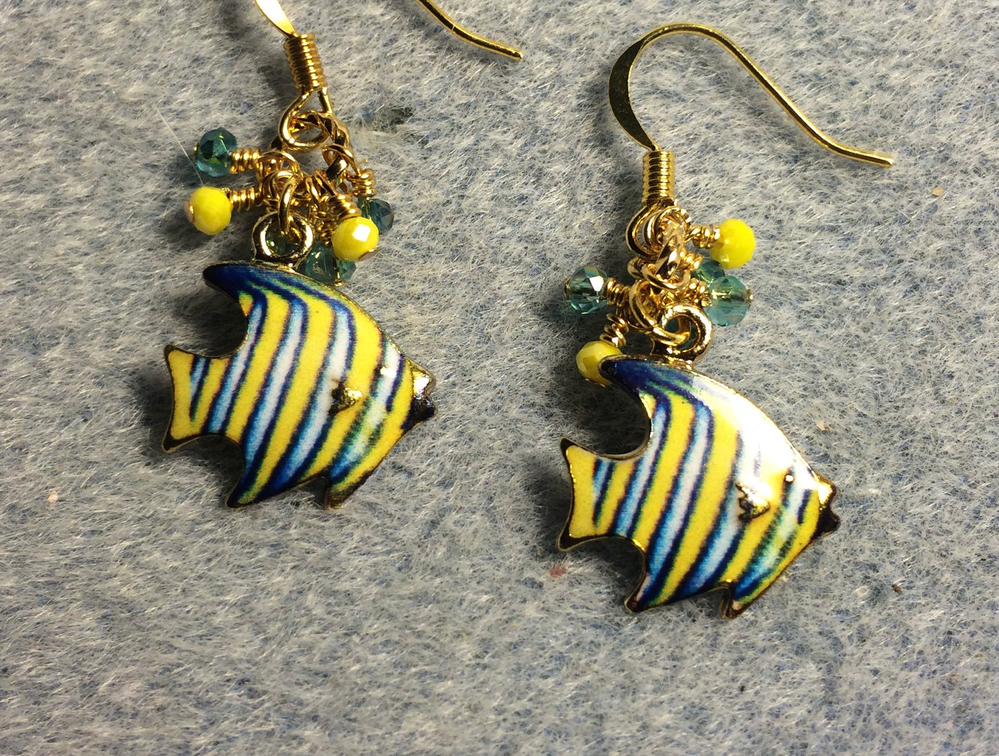 Turquoise and yellow enamel striped angelfish charm earrings adorned with tiny dangling turquoise and yellow Chinese crystal beads.