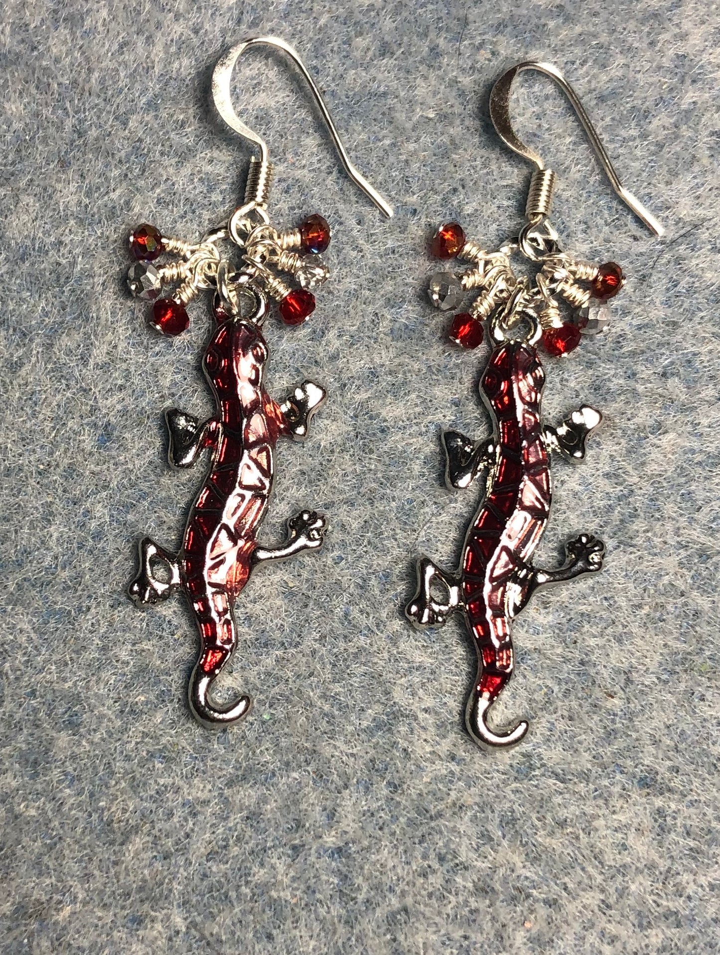Silver and red enamel lizard charm earrings adorned with small dangling silver and red Chinese crystal beads.