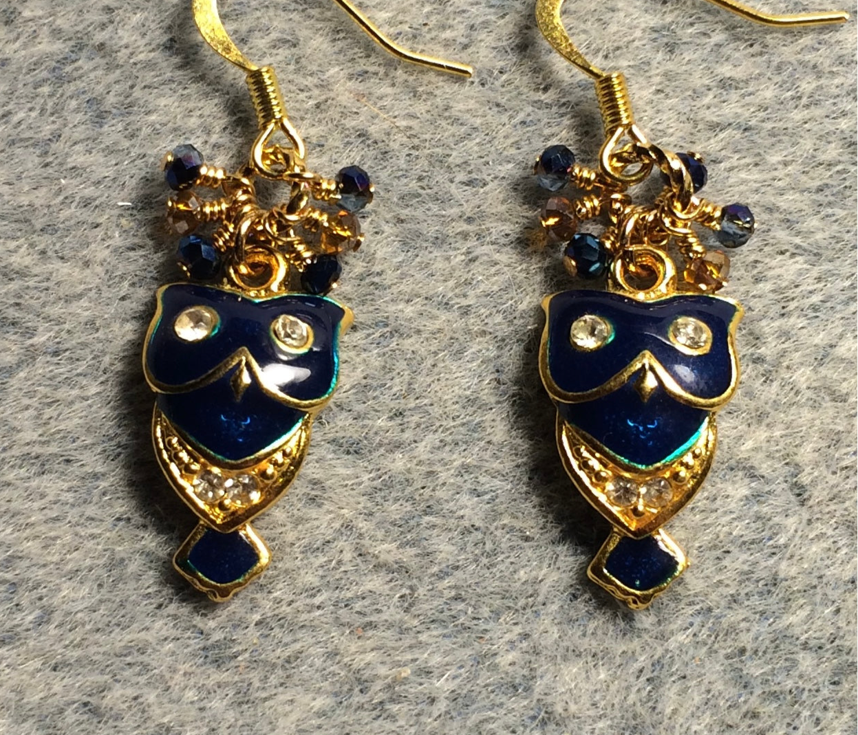 Vintage dark blue enamel and rhinestone owl charm earrings adorned with tiny dangling dark blue and gold Chinese crystal beads.