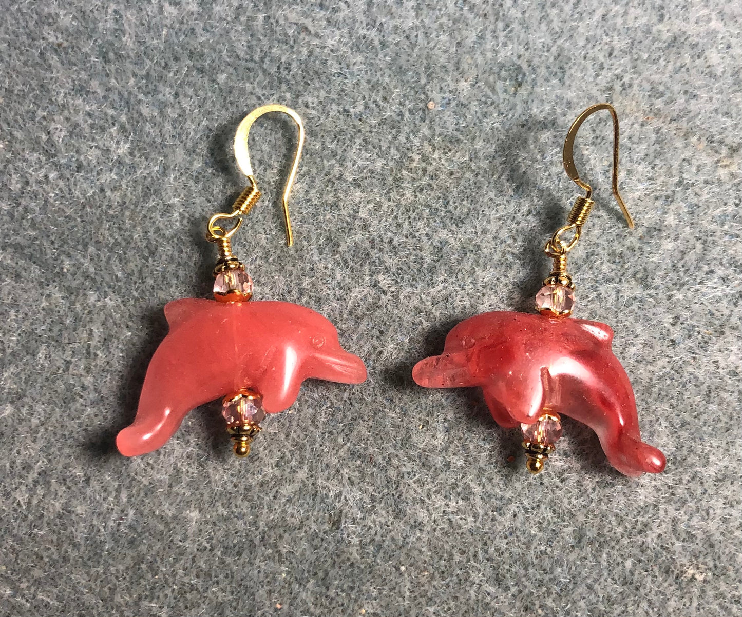 Pink cherry quartz gemstone dolphin bead earrings adorned with pink Chinese crystal beads.