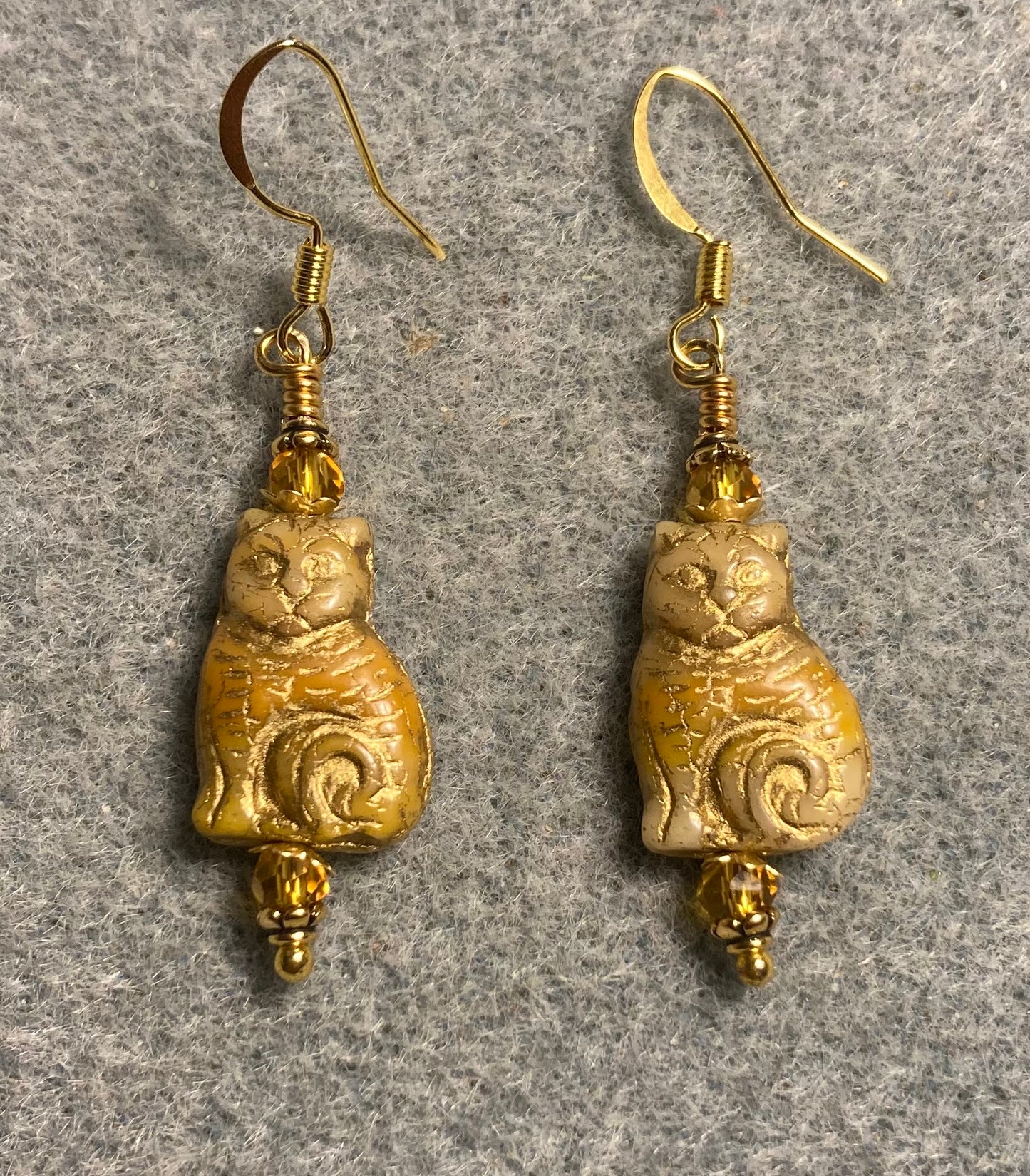 Medium amber (with gold inlay) Czech glass cat bead earrings adorned with amber Chinese crystal beads.