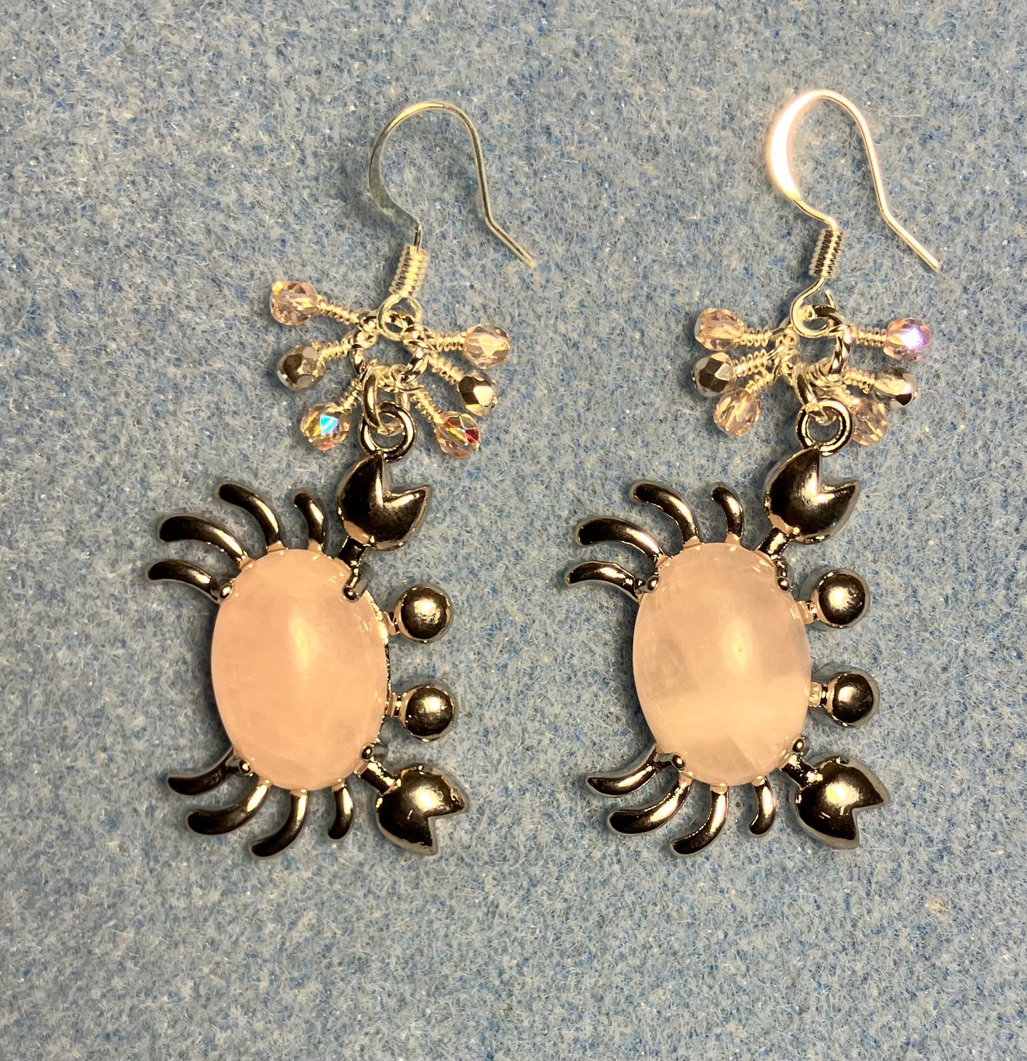 Large silver and pink rose quartz gemstone crab charm earrings adorned with small dangling pink and silver Czech glass beads.