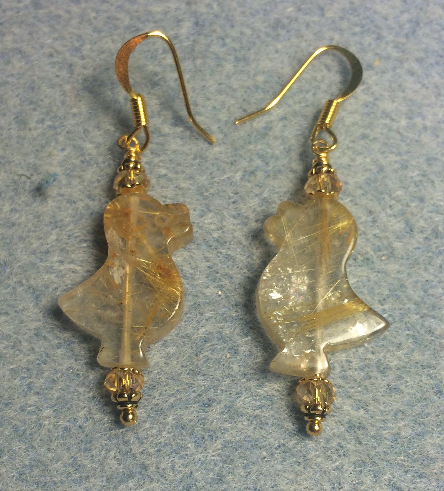 Rutilated quartz gemstone duckling bead earrings adorned with amber Chinese crystal beads.