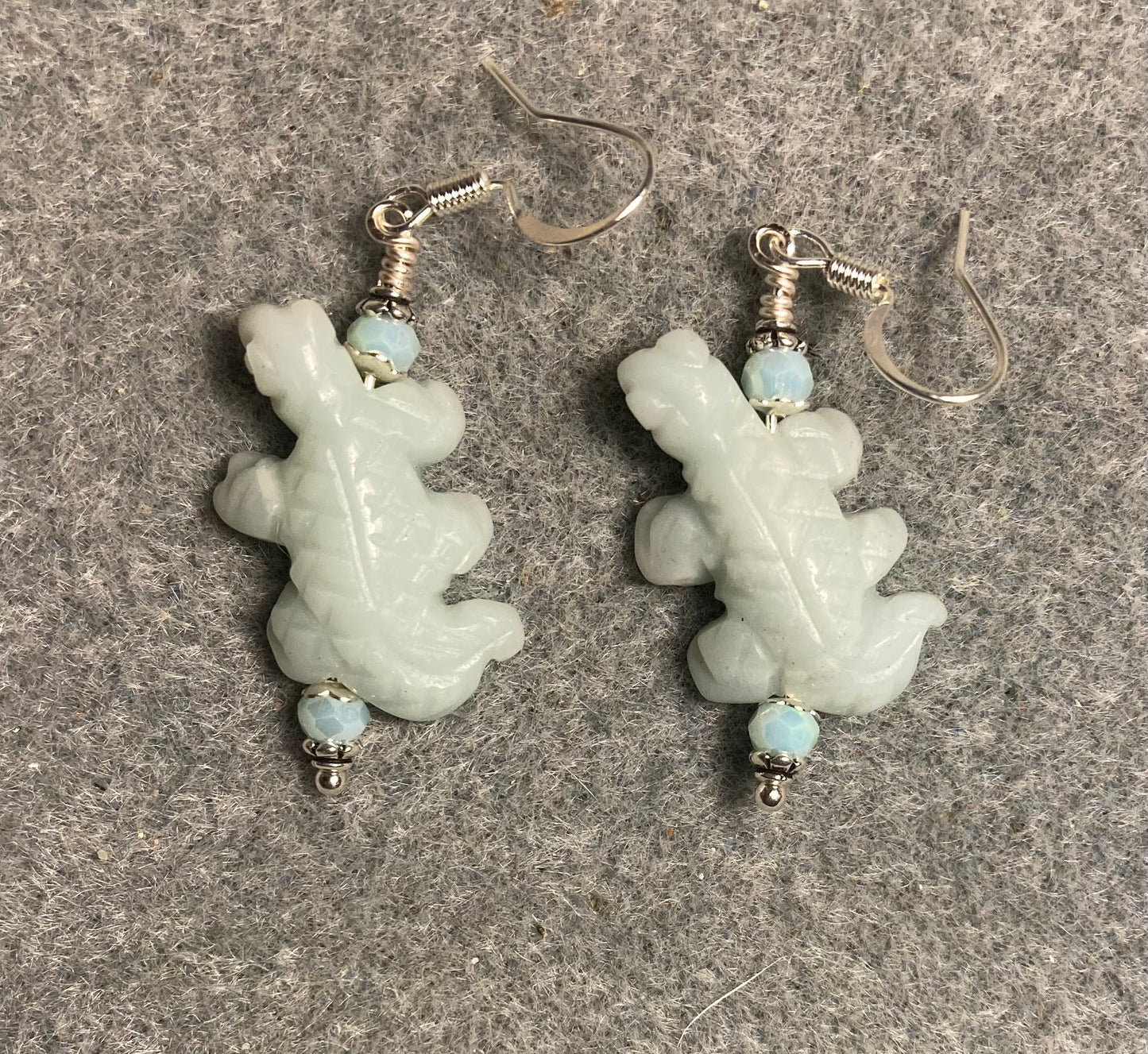 Amazonite gemstone lizard bead earrings adorned with light green Chinese crystal beads.