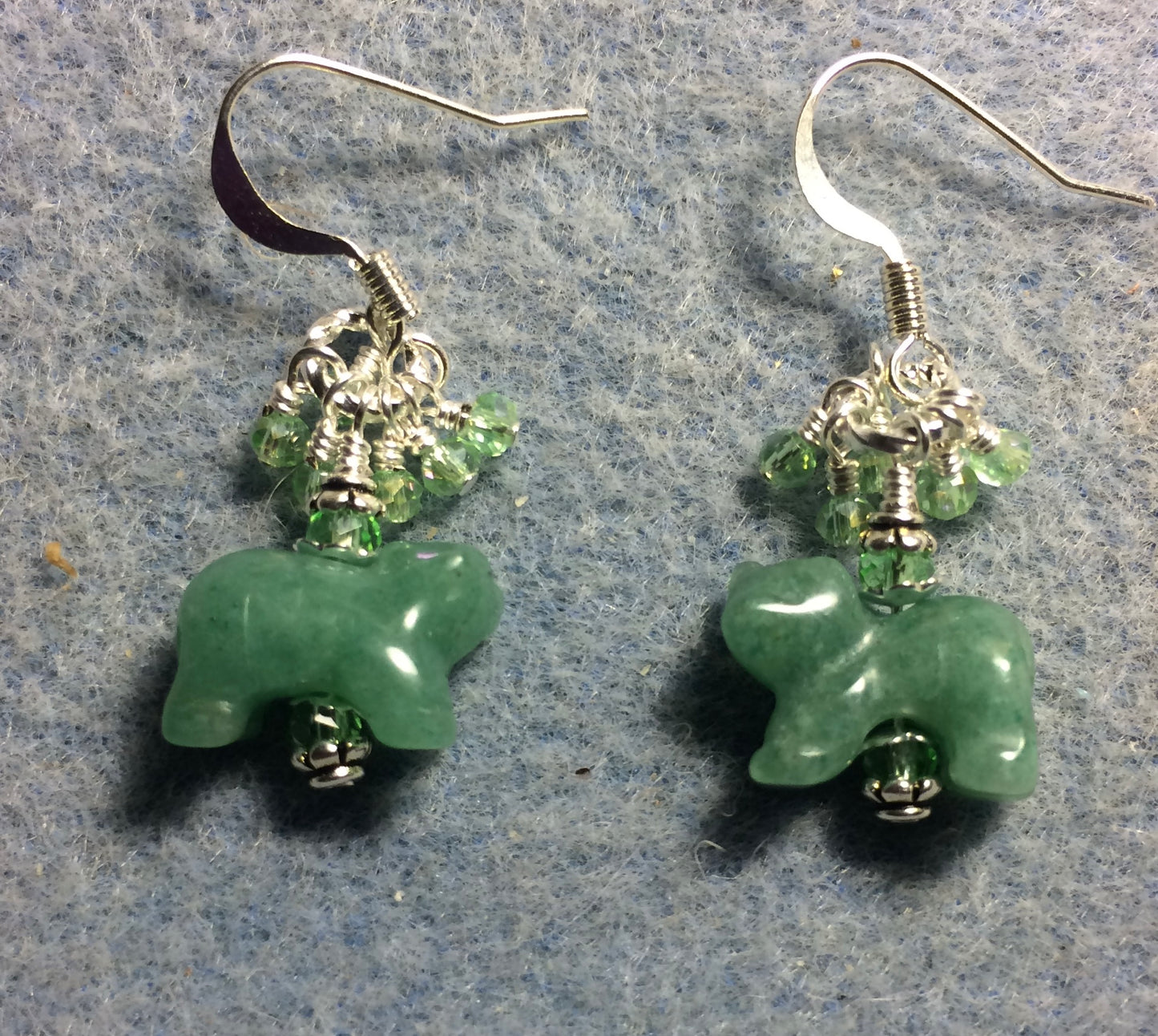 Small green aventurine gemstone bear bead earrings adorned with green Chinese crystal beads and tiny dangling green Chinese crystal beads.