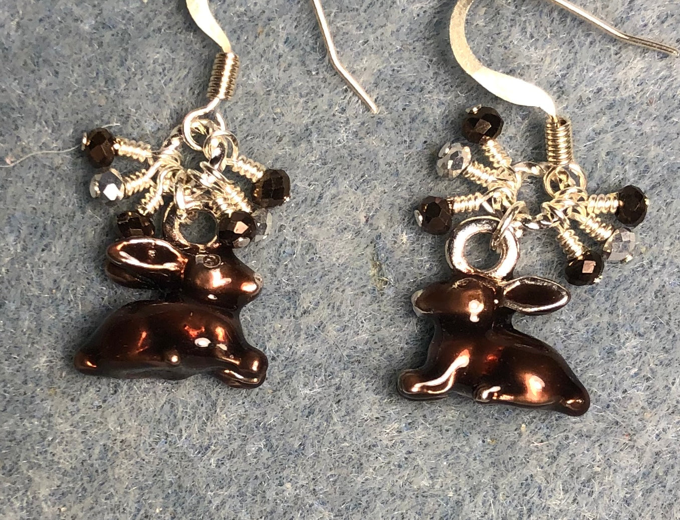 Silver and brown enamel rabbit charm earrings adorned with brown and silver Chinese crystal beads.
