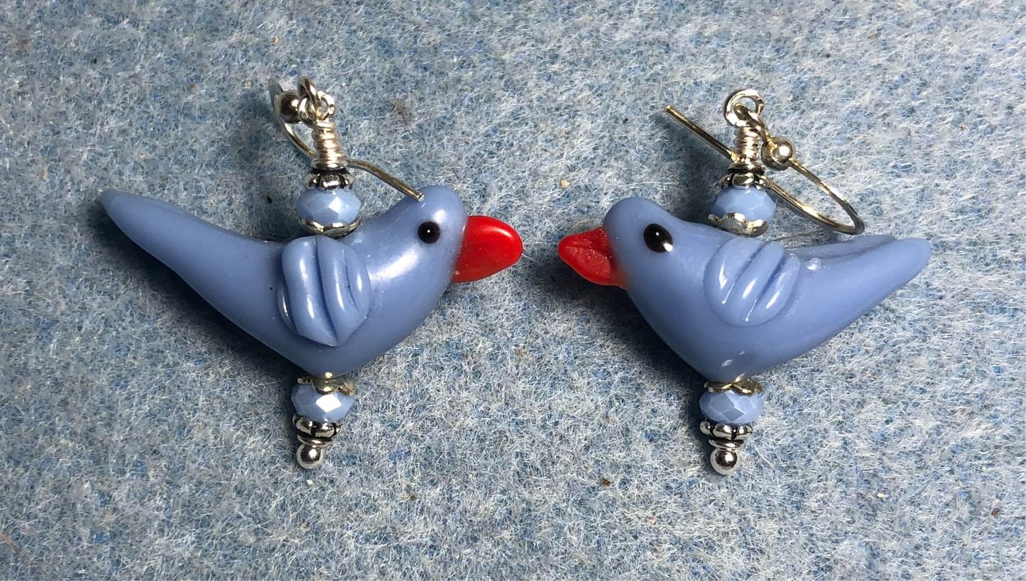 Opaque light blue lamp work songbird bead earrings adorned with light blue Chinese crystal beads.