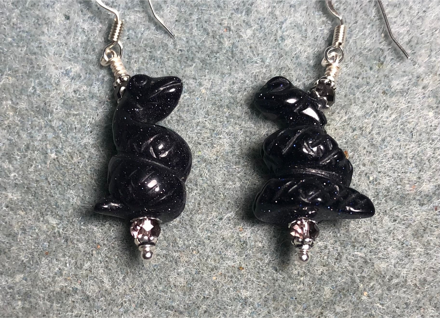 Purple blue goldstone gemstone coiled snake bead earrings adorned with purple Chinese crystal beads.