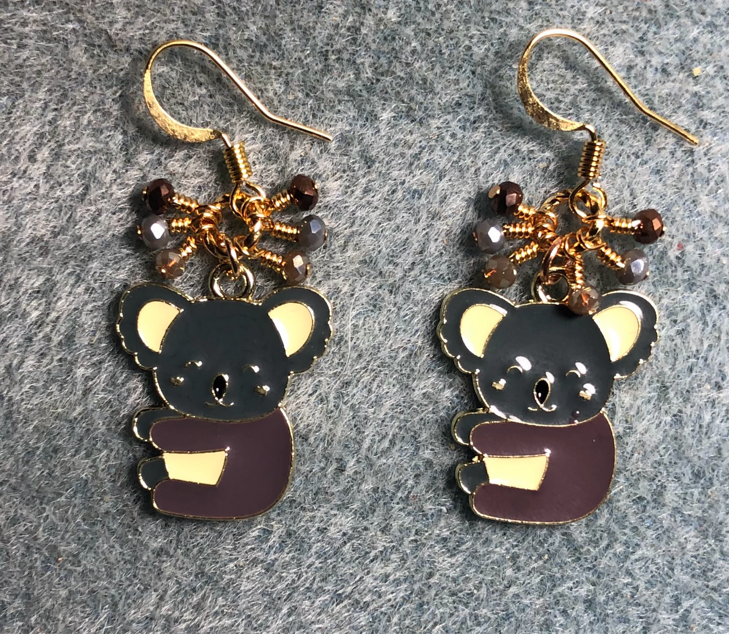 Brown, gray, and off white enamel koala bear charm earrings adorned with tiny dangling brown, gray, and tan Chinese crystal beads.