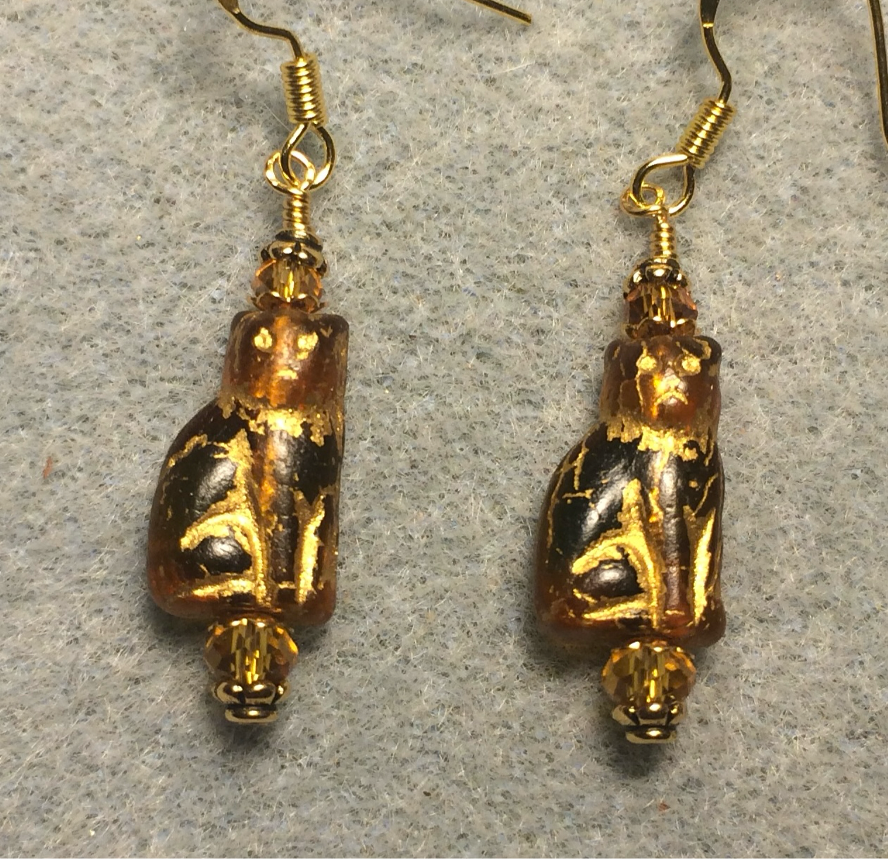 Small olive green topaz (with gold inlay) Czech glass cat bead earrings adorned with topaz Chinese crystal beads.
