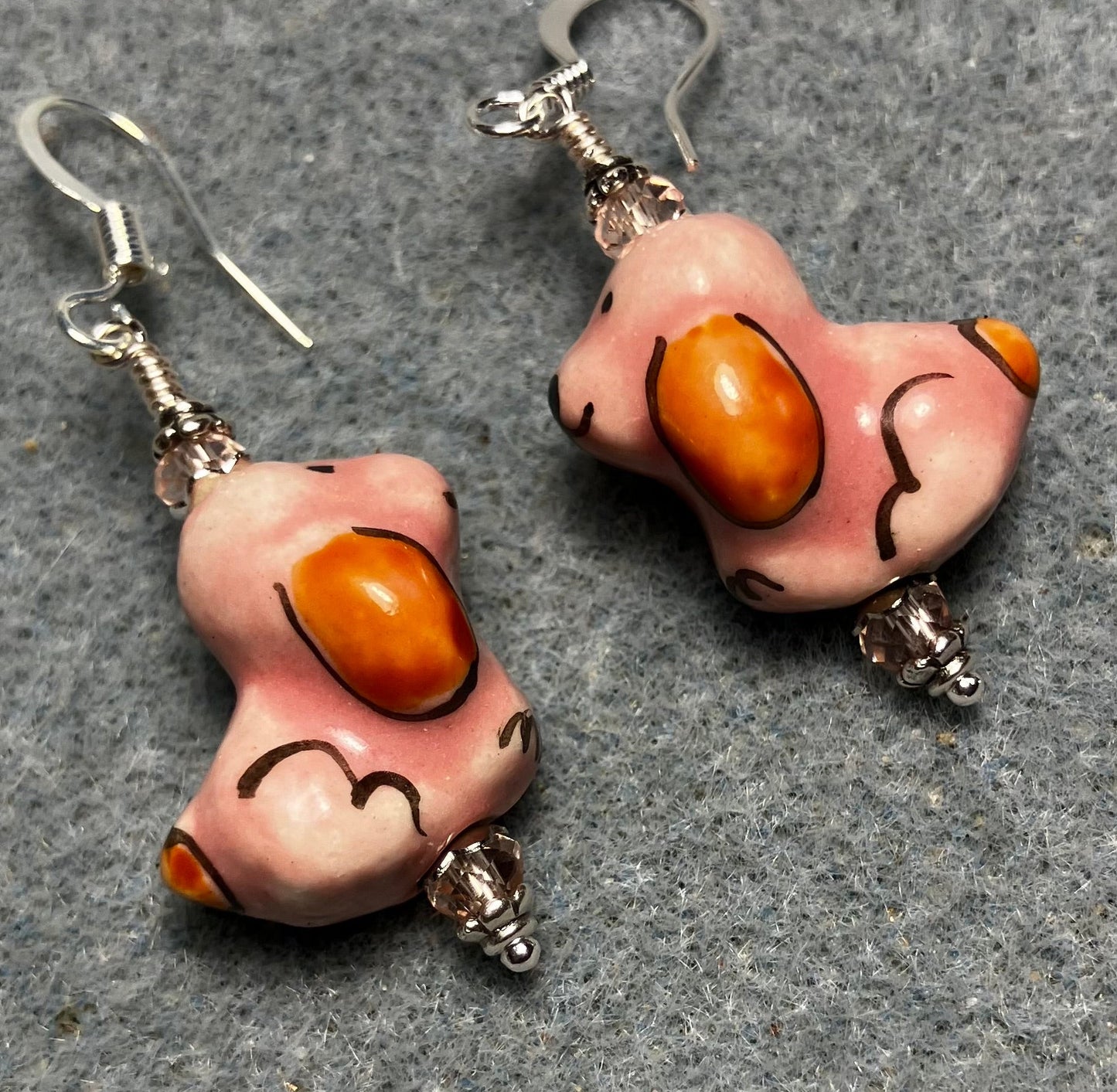 Pink and brown ceramic puppy dog bead earrings adorned with pink Chinese crystal beads.