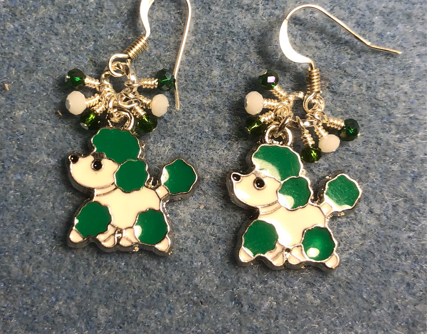 Green and white enamel poodle charm earrings adorned with tiny dangling green and white Chinese crystal beads.