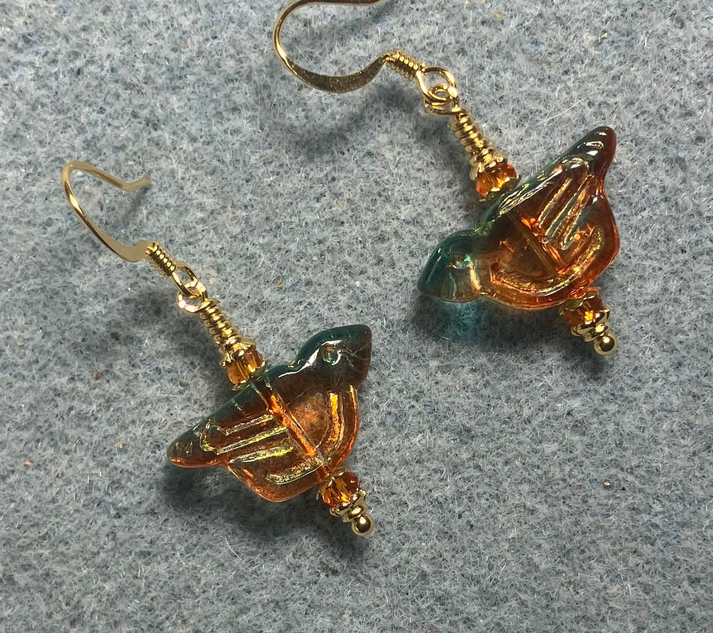 Translucent teal and tangerine (with gold wash) Czech glass bird bead earrings adorned with tangerine Chinese crystal beads.