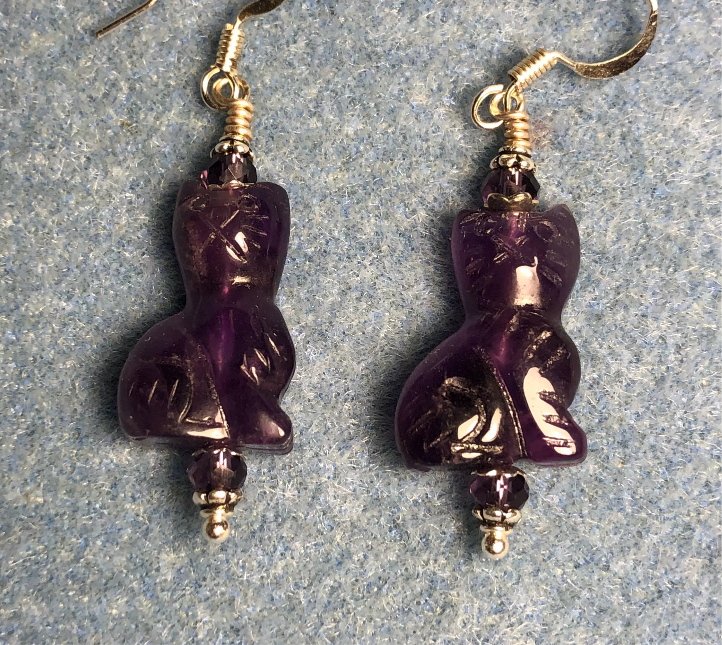 Genuine amethyst cat bead earrings adorned with purple Chinese crystal beads.