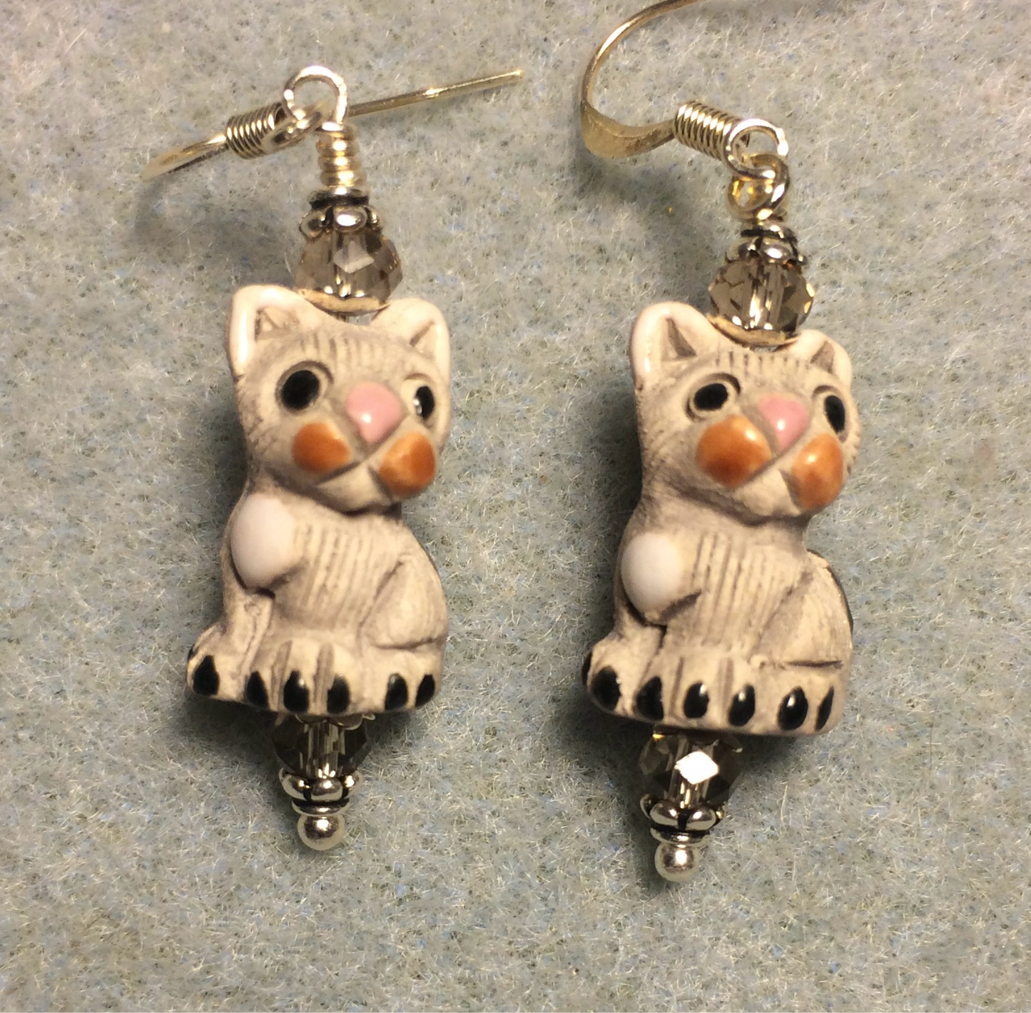 Small gray ceramic cat bead earrings adorned with clear Chinese crystal beads.