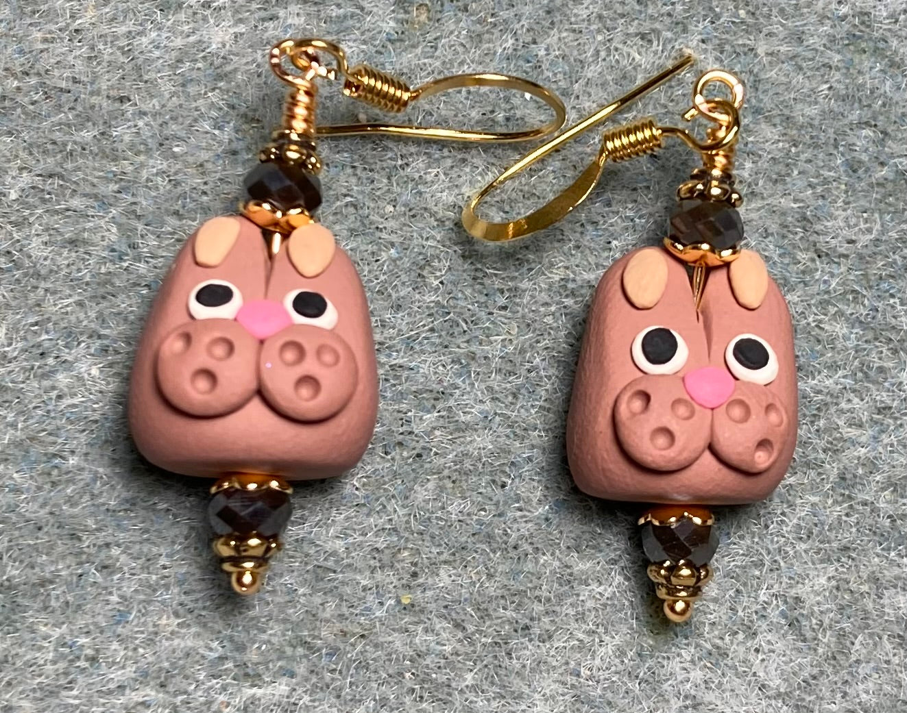 Brown and pink polymer clay rabbit bead earrings adorned with brown Chinese crystal beads.