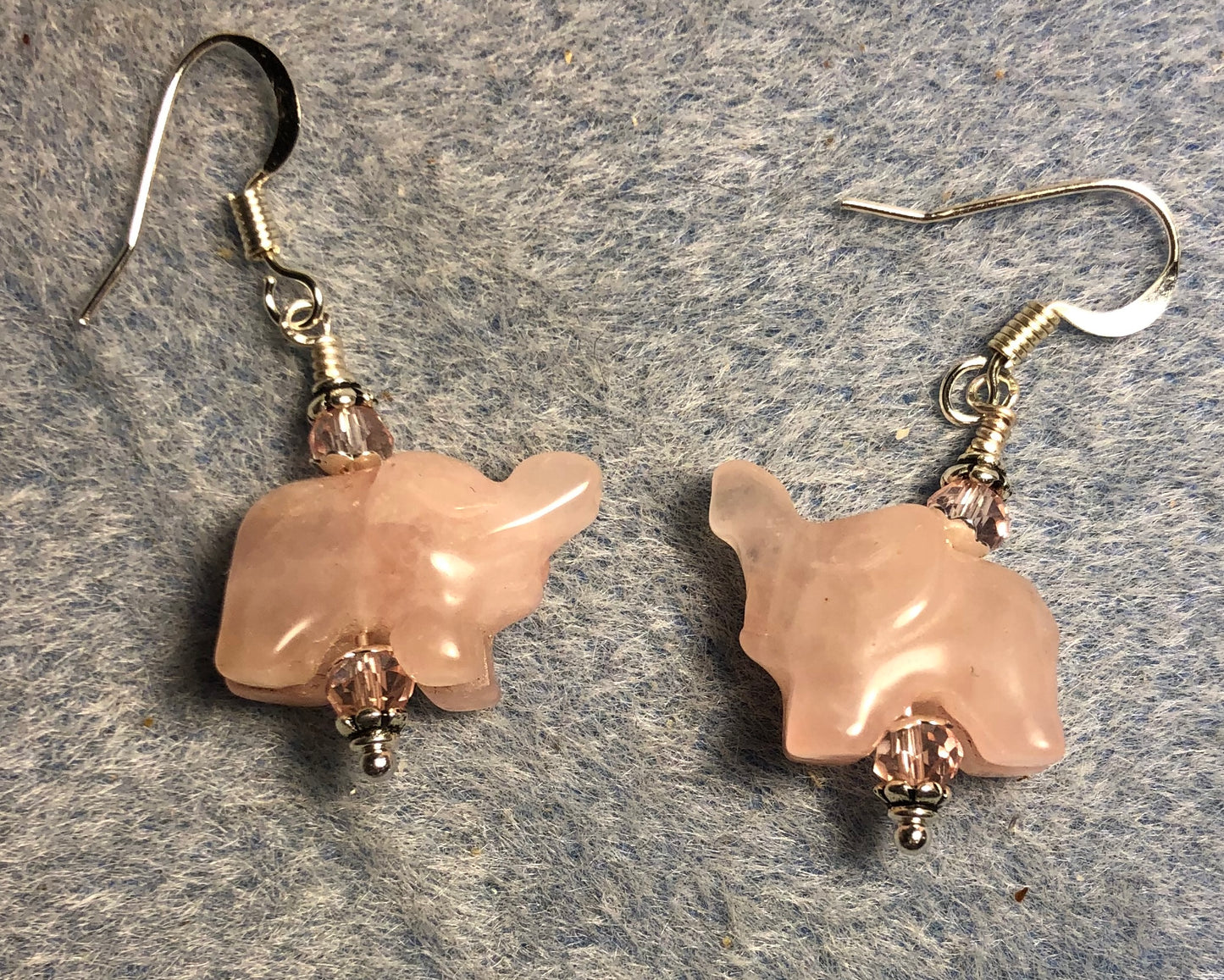 Small pink rose quartz gemstone elephant bead earrings adorned with pink Chinese crystal beads.