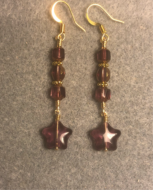 Small violet Czech glass star bead earrings adorned with violet Czech glass beads.