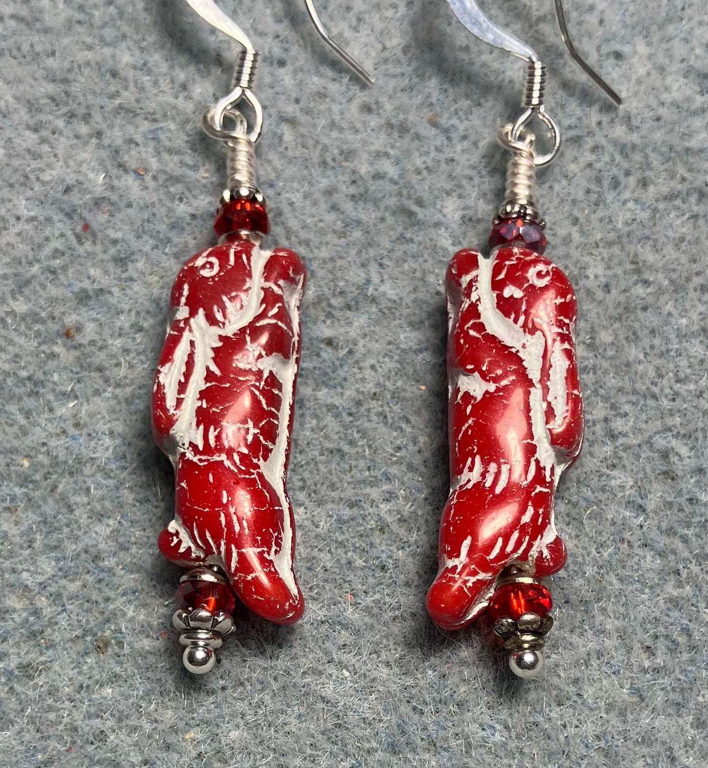 Small red (with white inlay) Czech glass bunny rabbit bead earrings adorned with red Chinese crystal beads.