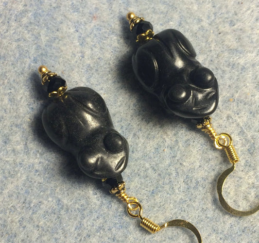 Carved black stone frog bead earrings adorned with black Chinese crystal beads.