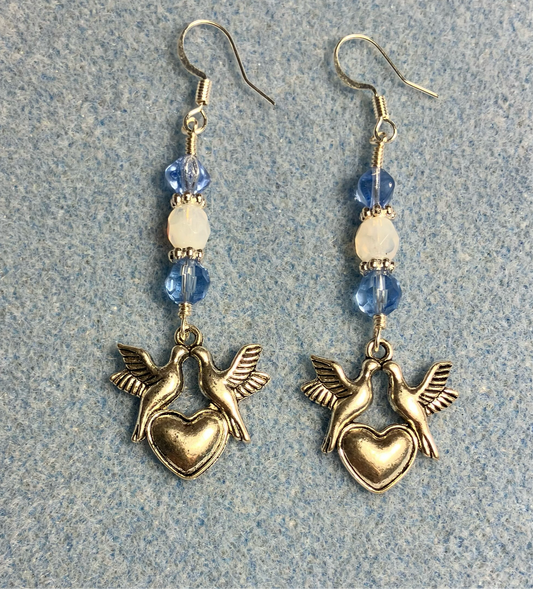 Silver dove and heart charm earrings adorned with light blue and white Czech glass beads