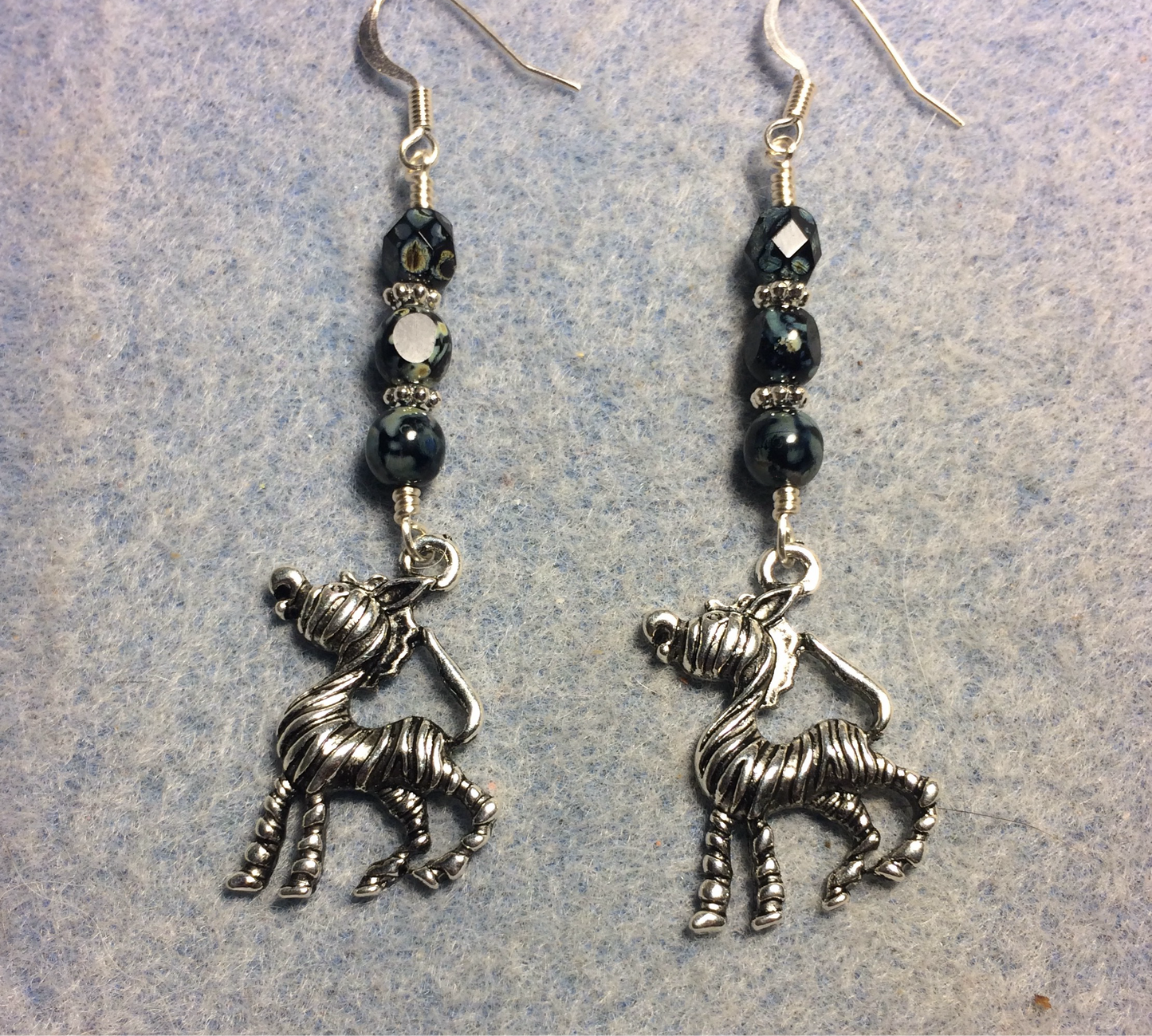 Silver silly zebra charm earrings adorned with black Picasso Czech glass beads