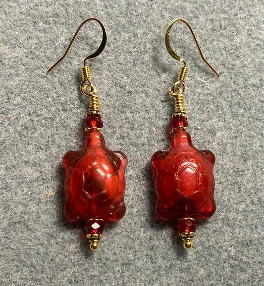 Cranberry red Czech glass turtle bead earrings adorned with red Chinese crystal beads.