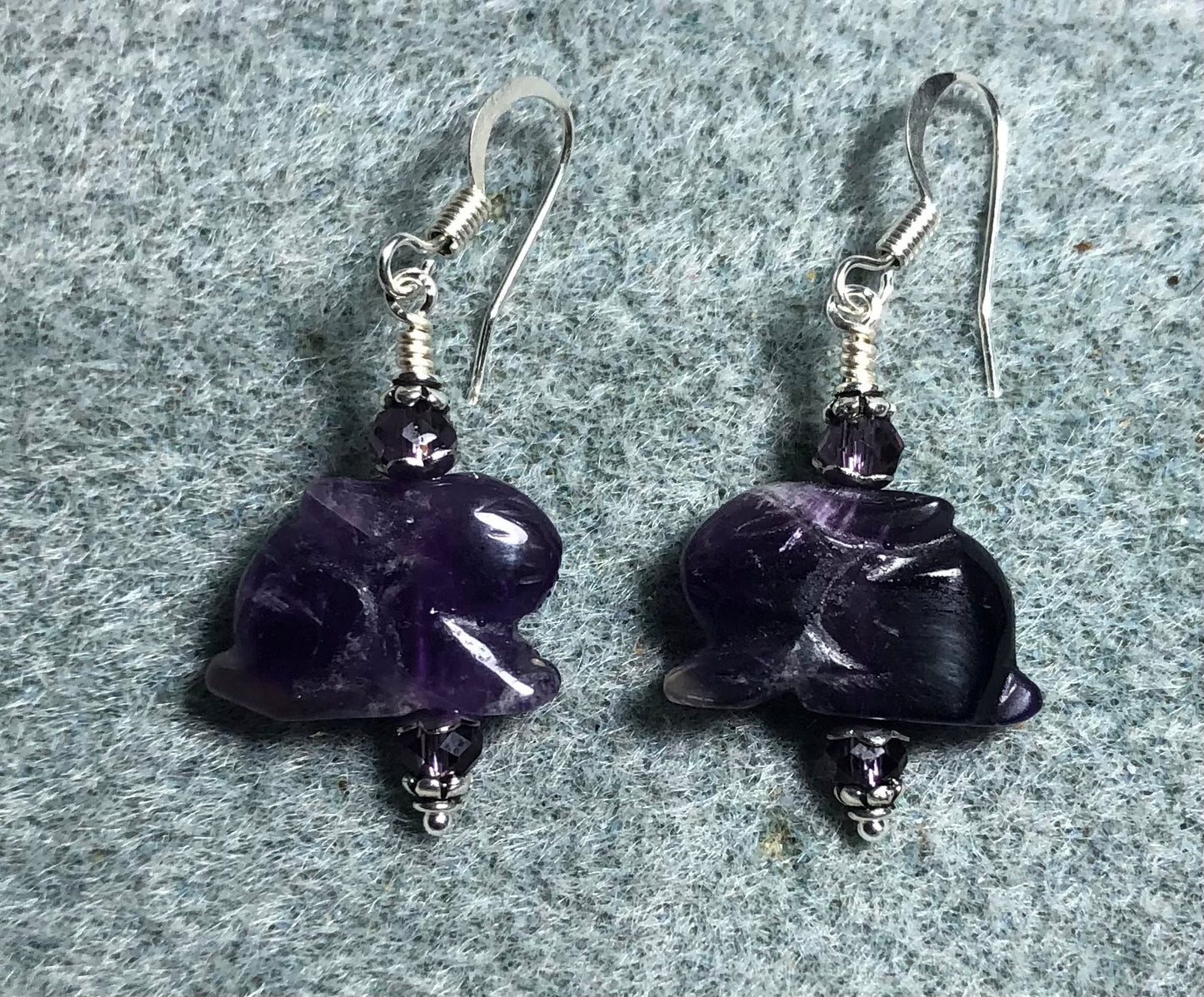 Genuine amethyst gemstone rabbit fetish bead earrings adorned with purple Chinese crystal beads.