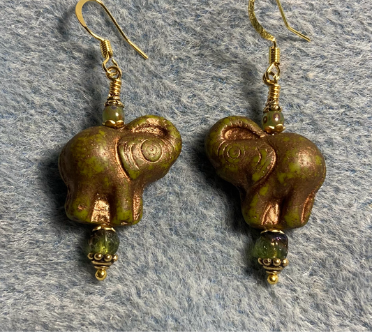 Olive green (with copper inlay) Czech glass elephant bead earrings adorned with olive green Czech glass beads.