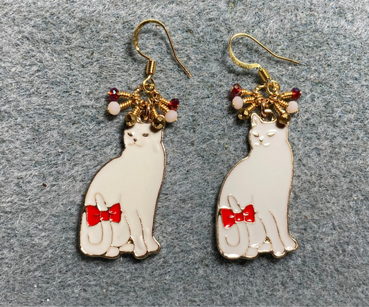 White and red enamel cat charm earrings adorned with tiny dangling white, red, and gold Chinese crystal beads.