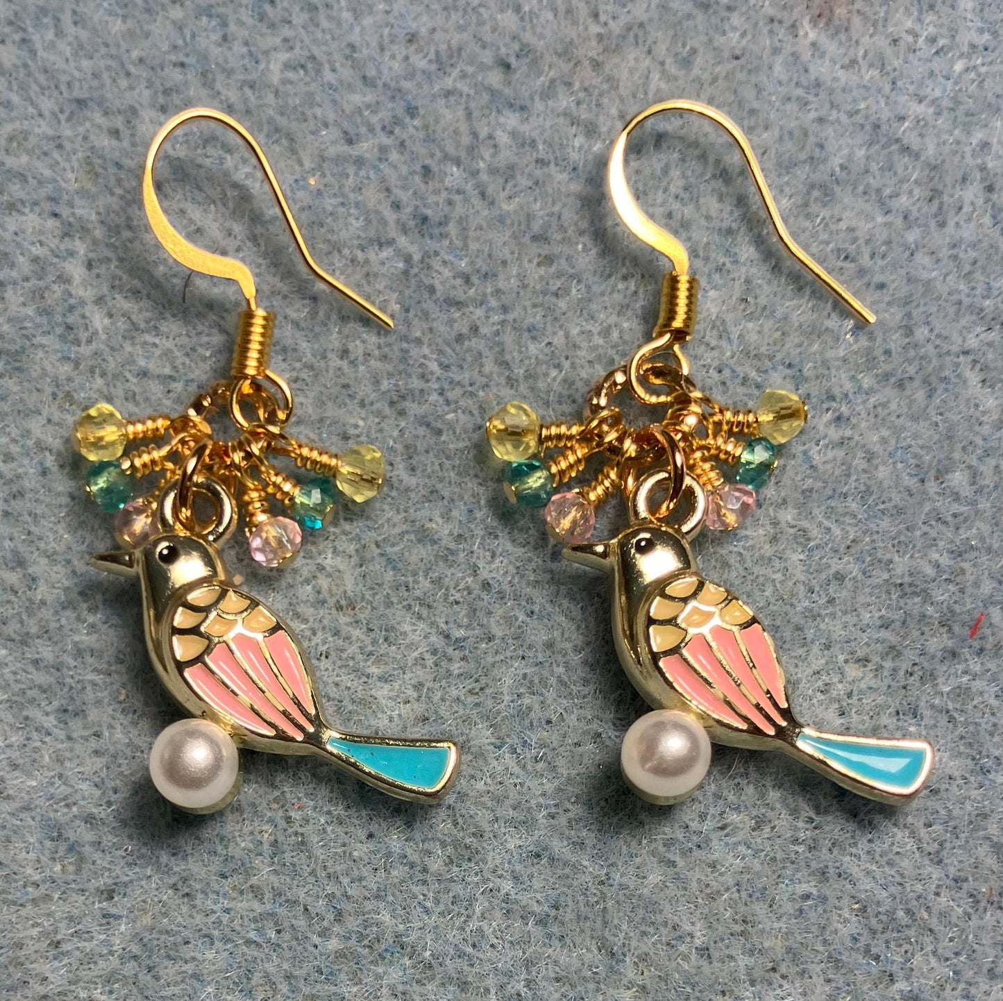 Pink, yellow, and turquoise enamel finch charm earrings adorned with tiny pink, yellow, and turquoise Chinese crystal beads.